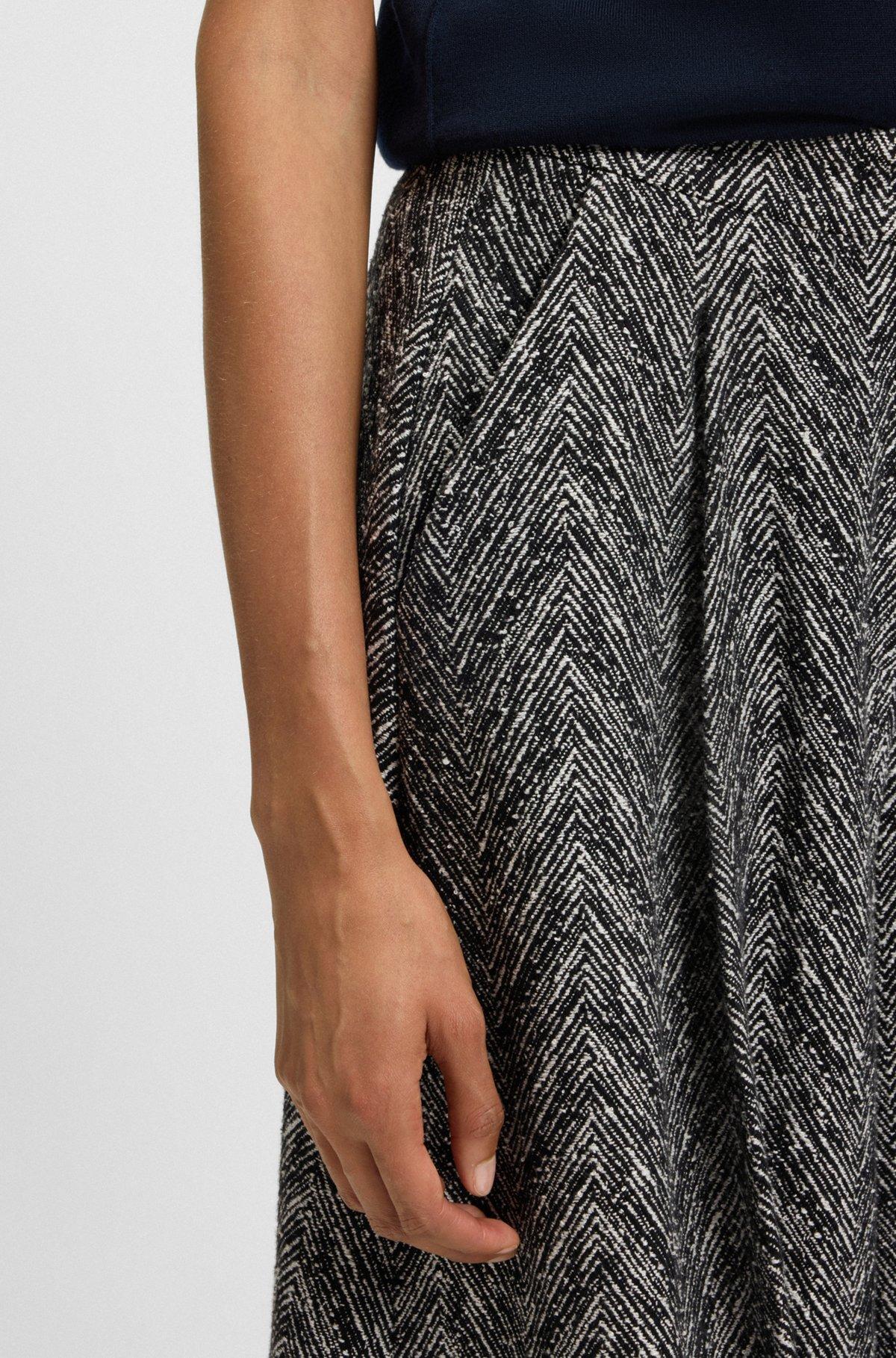 Regular-fit wide-leg trousers in herringbone tweed Product Image