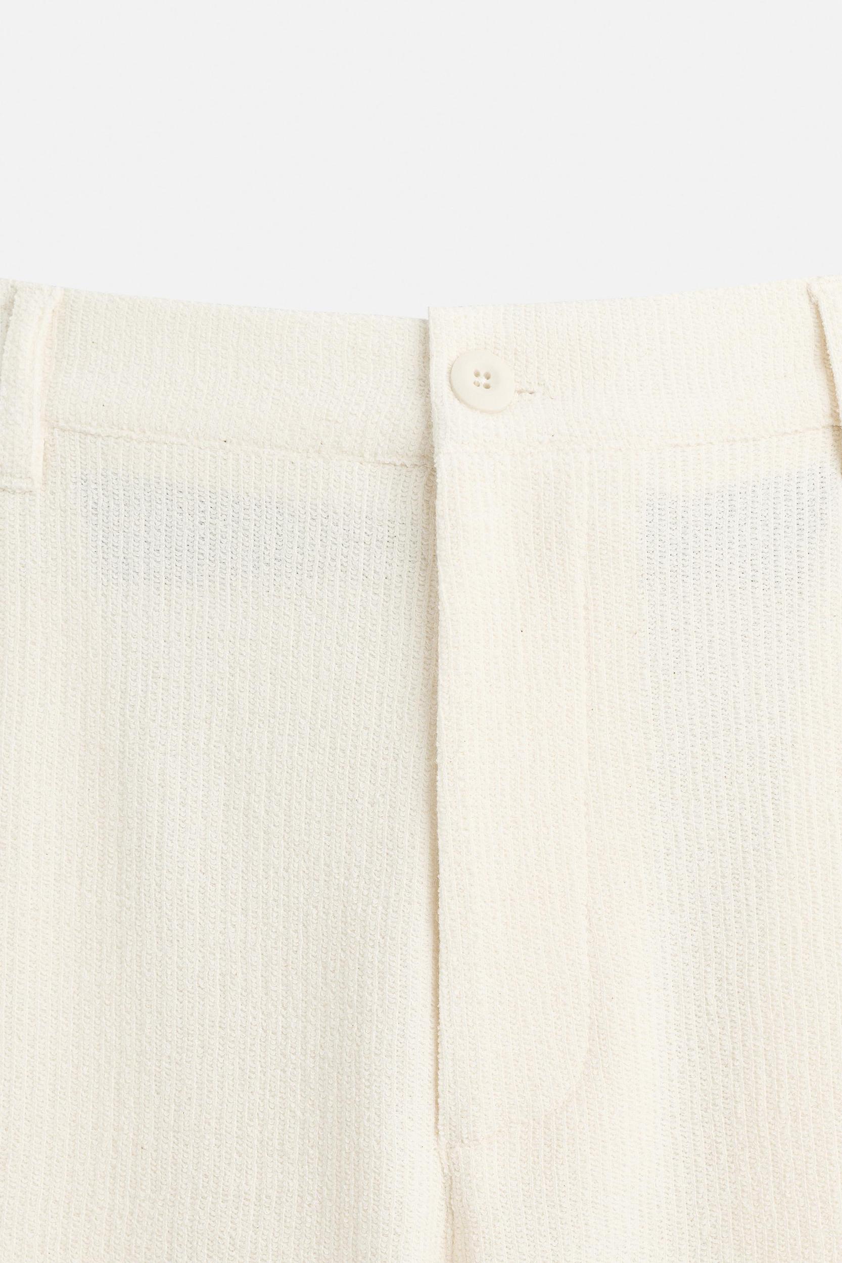 TEXTURED CHINO PANTS Product Image