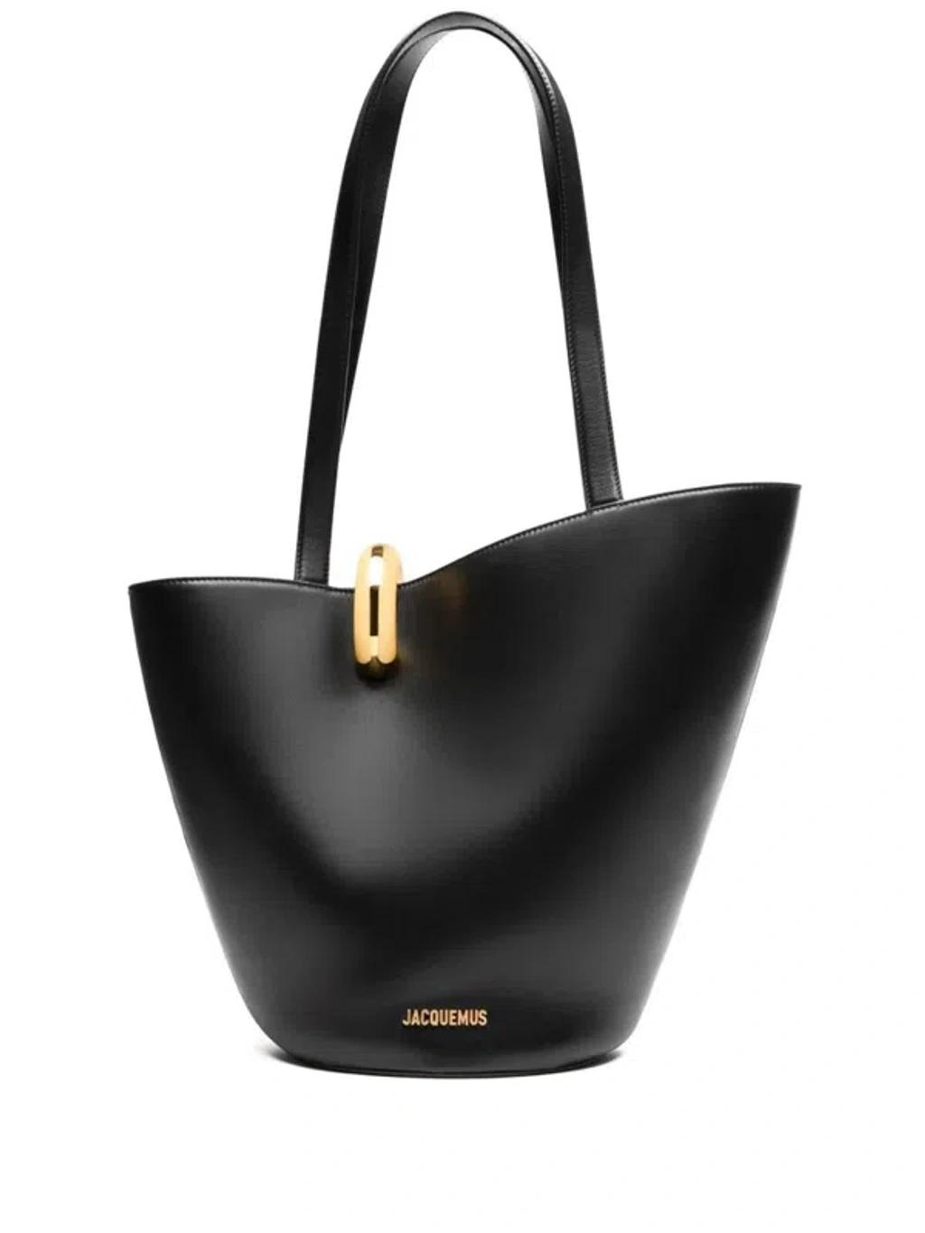 JACQUEMUS The Medium Bambola Asymmetric Leather Bucket Bag In Black 990 Product Image