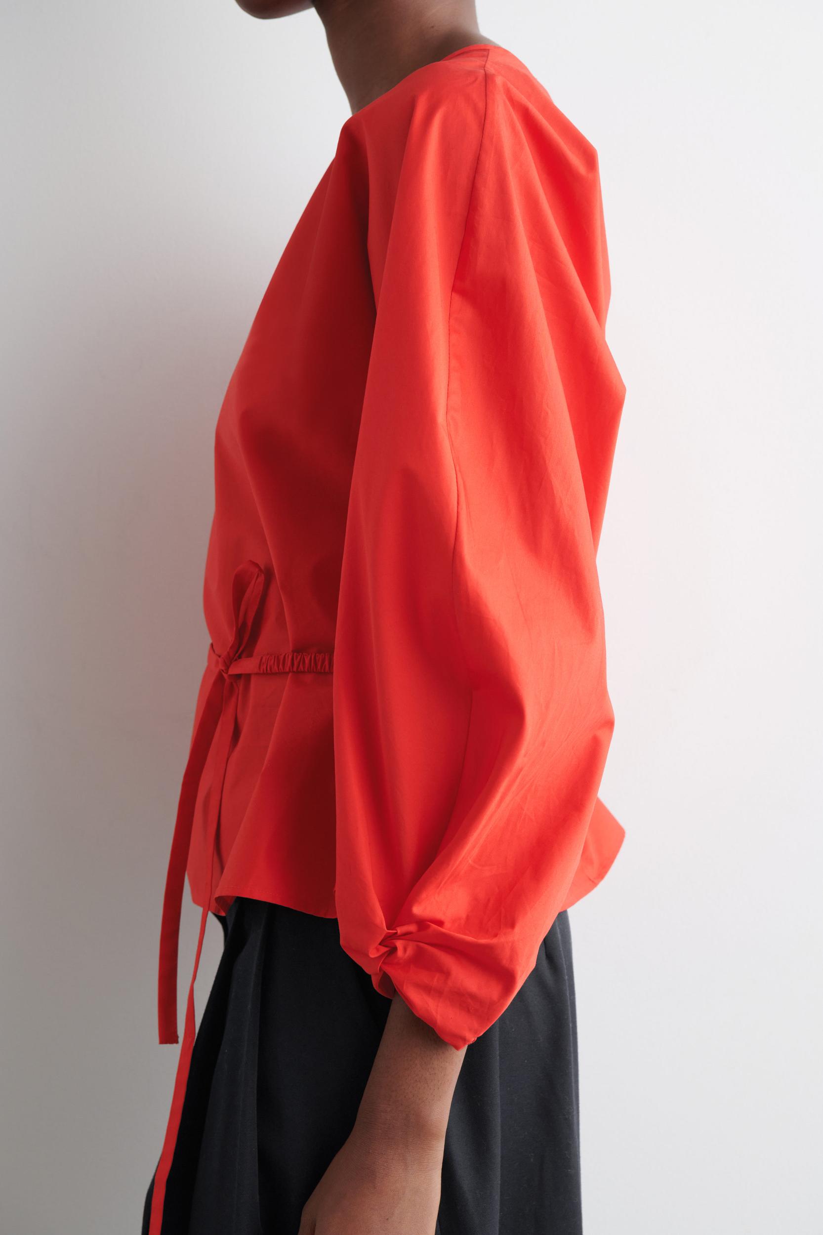 DRAWSTRING PEPLUM BLOUSE Product Image