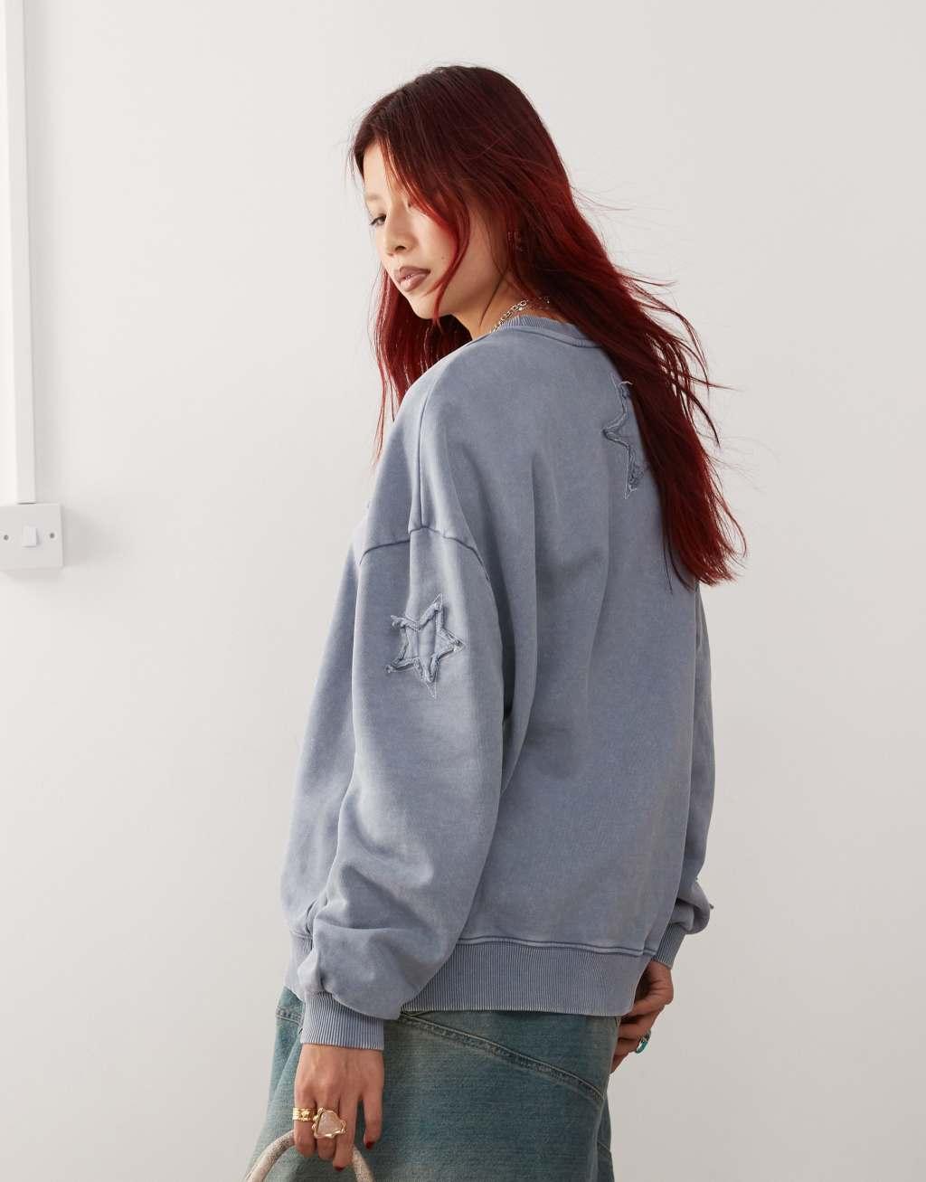 Monki oversized sweatshirt with applique stars in washed blue Product Image