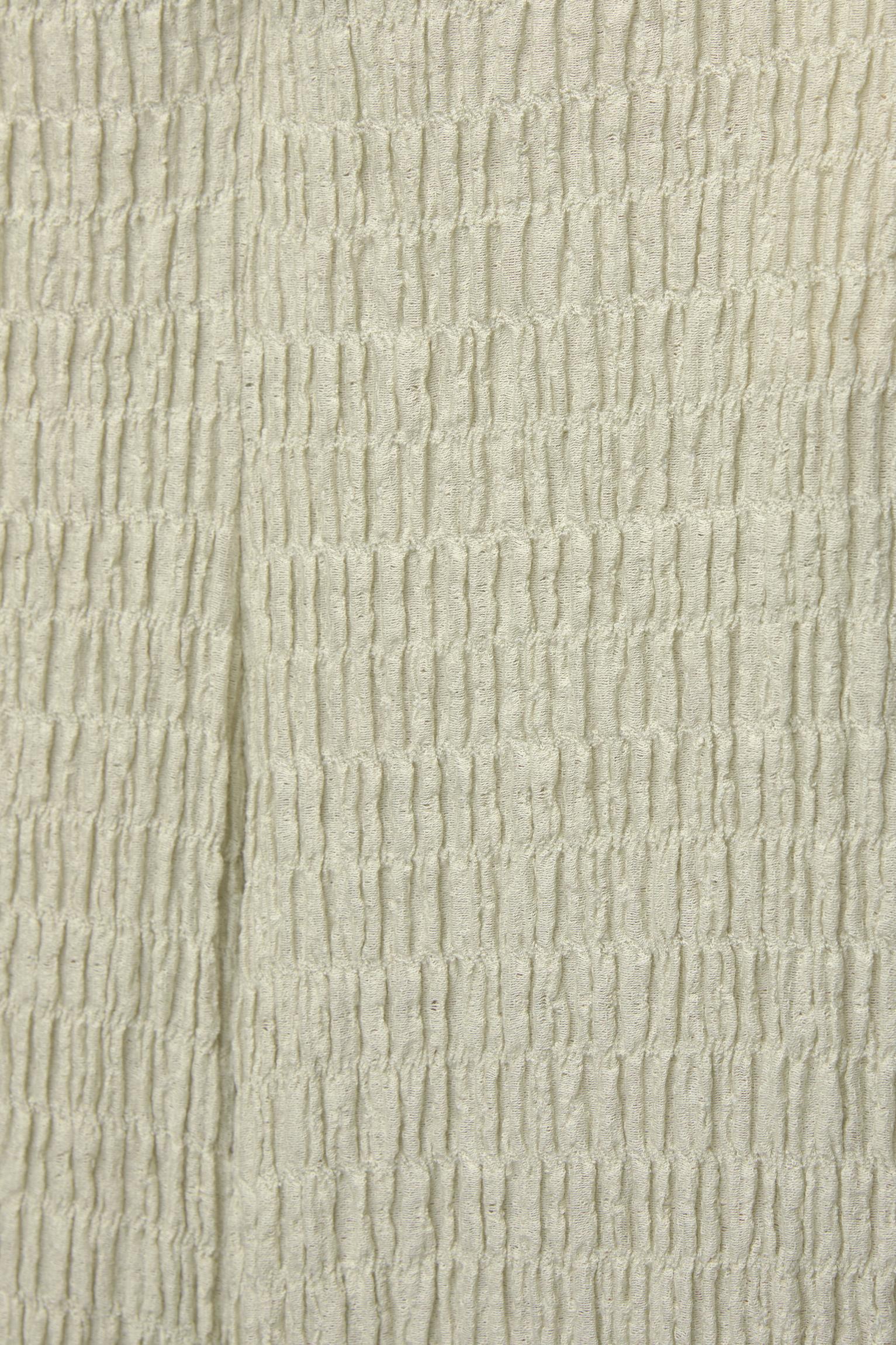 Wide leg pants in creased fabric Product Image