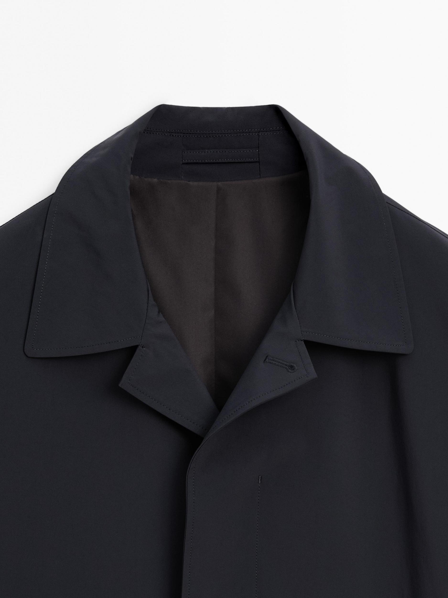 Lightweight trench coat with hidden buttons Product Image