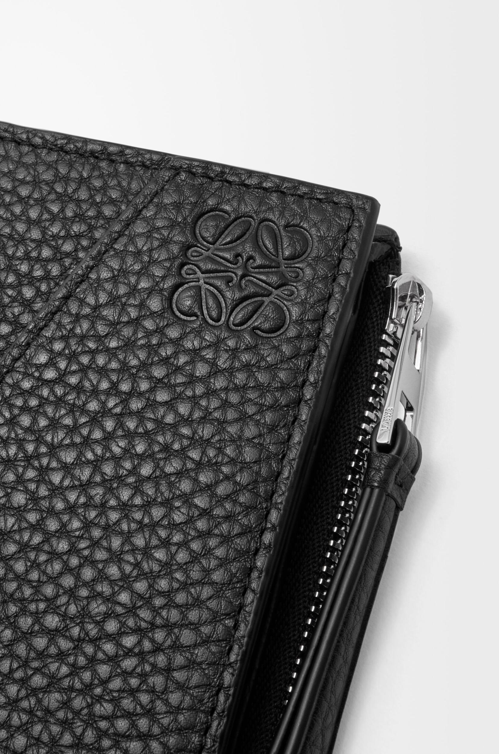 Puzzle slim compact wallet in supple grained calfskin Product Image