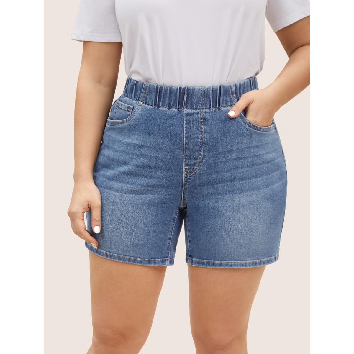 Plus Size Dark Wash Elastic Waist Roll Hem Denim Shorts Women Denimlightblue Roll Hem Medium stretch Everyday Slanted pocket Casual Denim Shorts BloomChic 14/1X Product Image