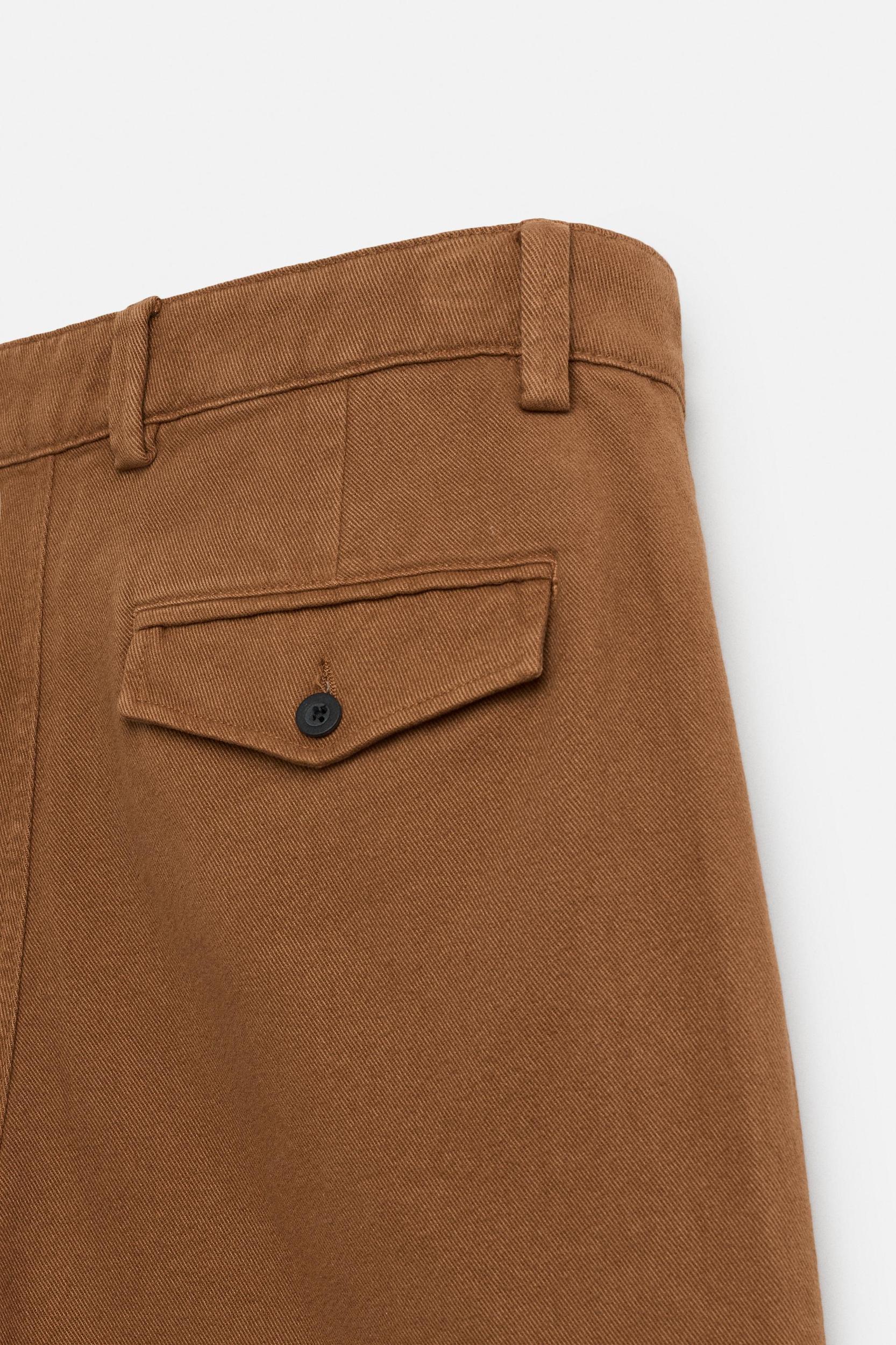 RELAXED FIT PLEATED BERMUDA SHORTS Product Image