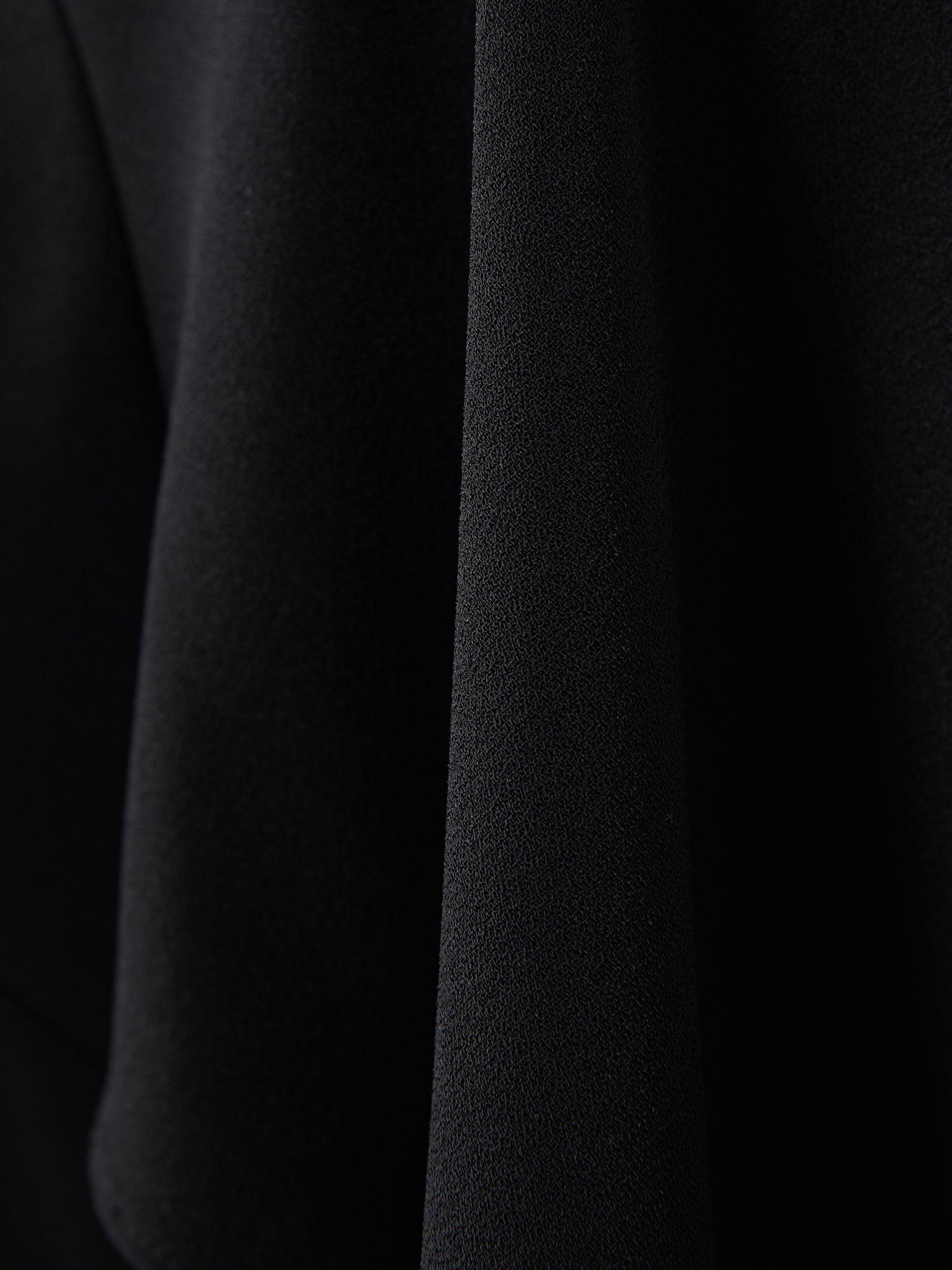 Florere Relaxed Fit Cape Sleeve Jumpsuit in Black Product Image