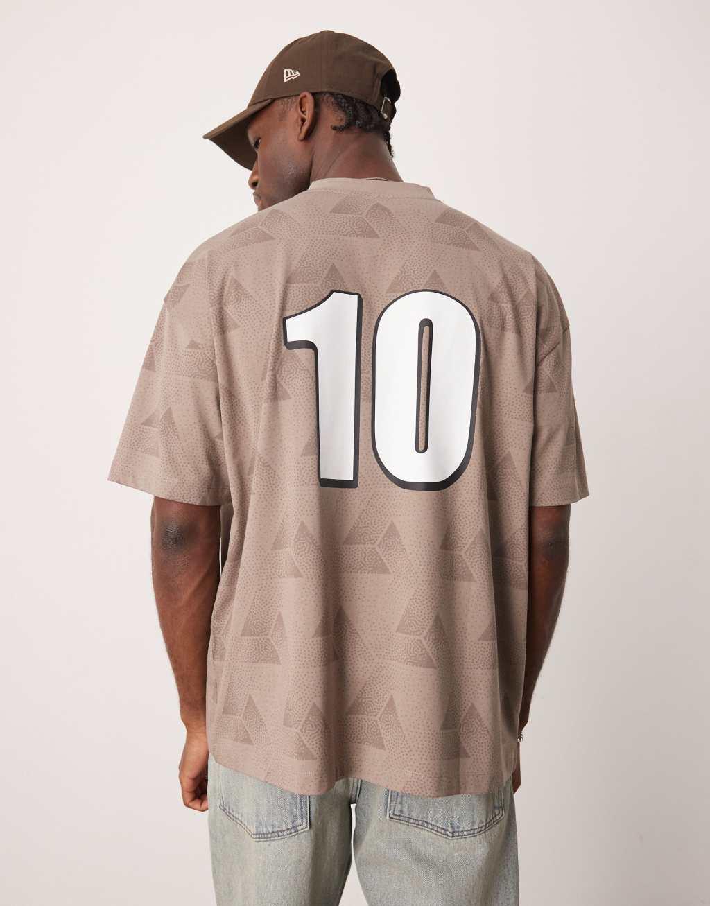 ASOS DESIGN oversized v-neck T-shirt with sports graphic in stone Product Image