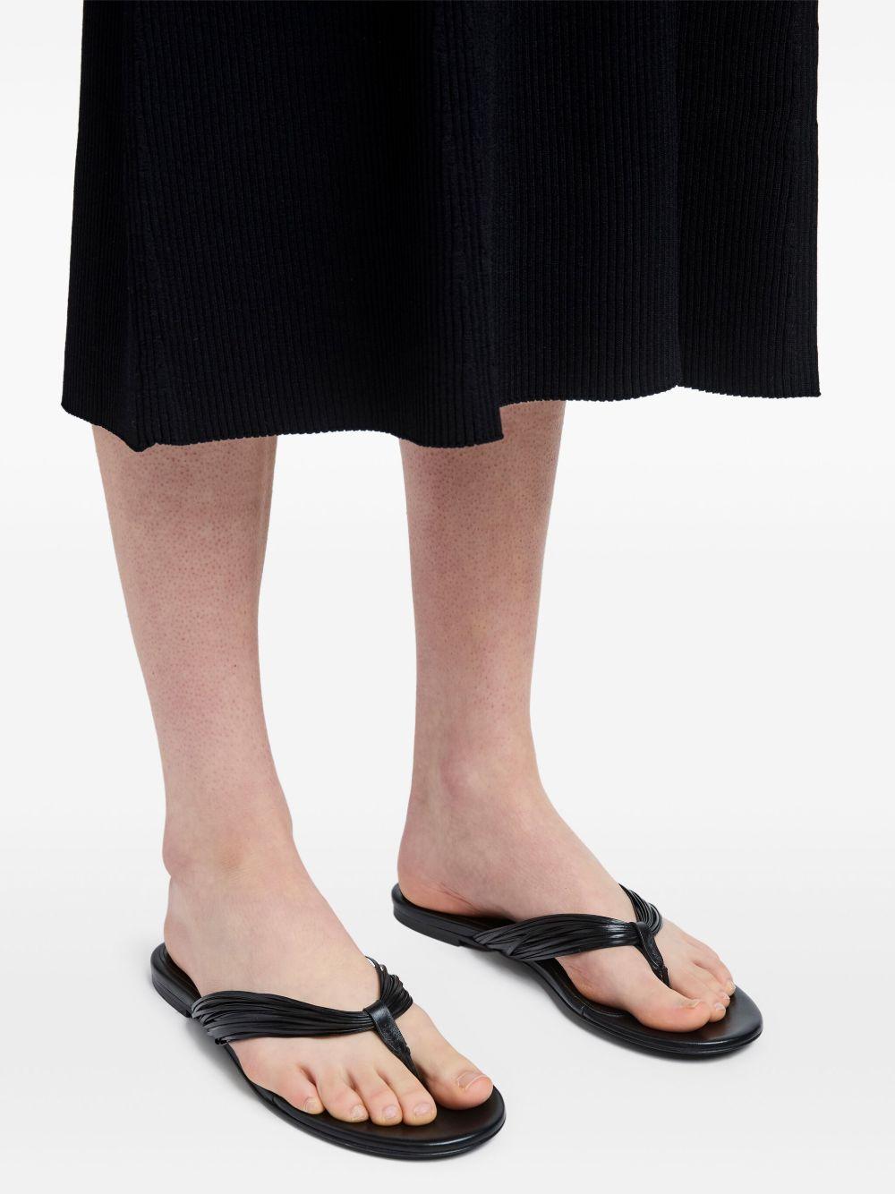 fringe-detail flip flops Product Image