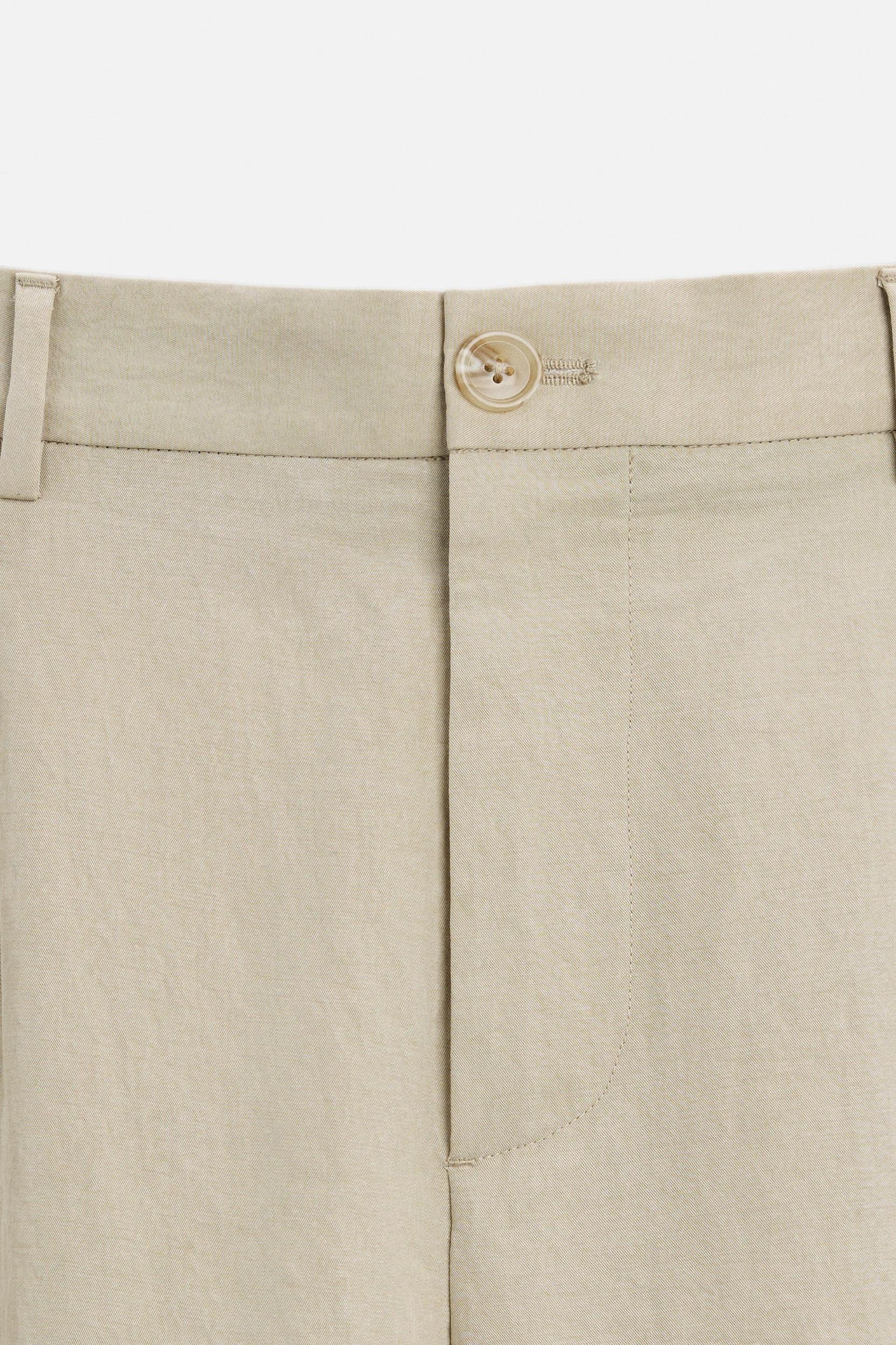 PLEATED WIDE FIT PANTS Product Image