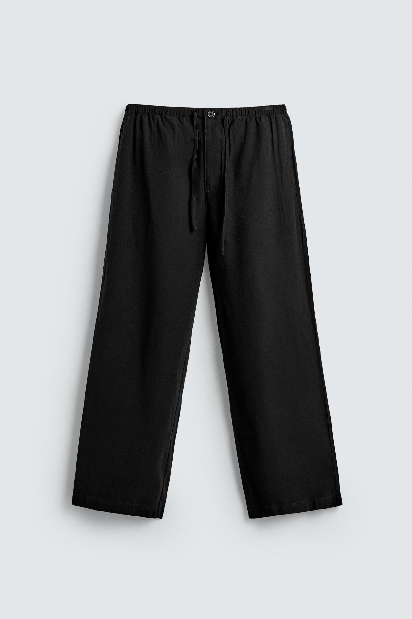 RELAXED FIT FLOWY PANTS Product Image