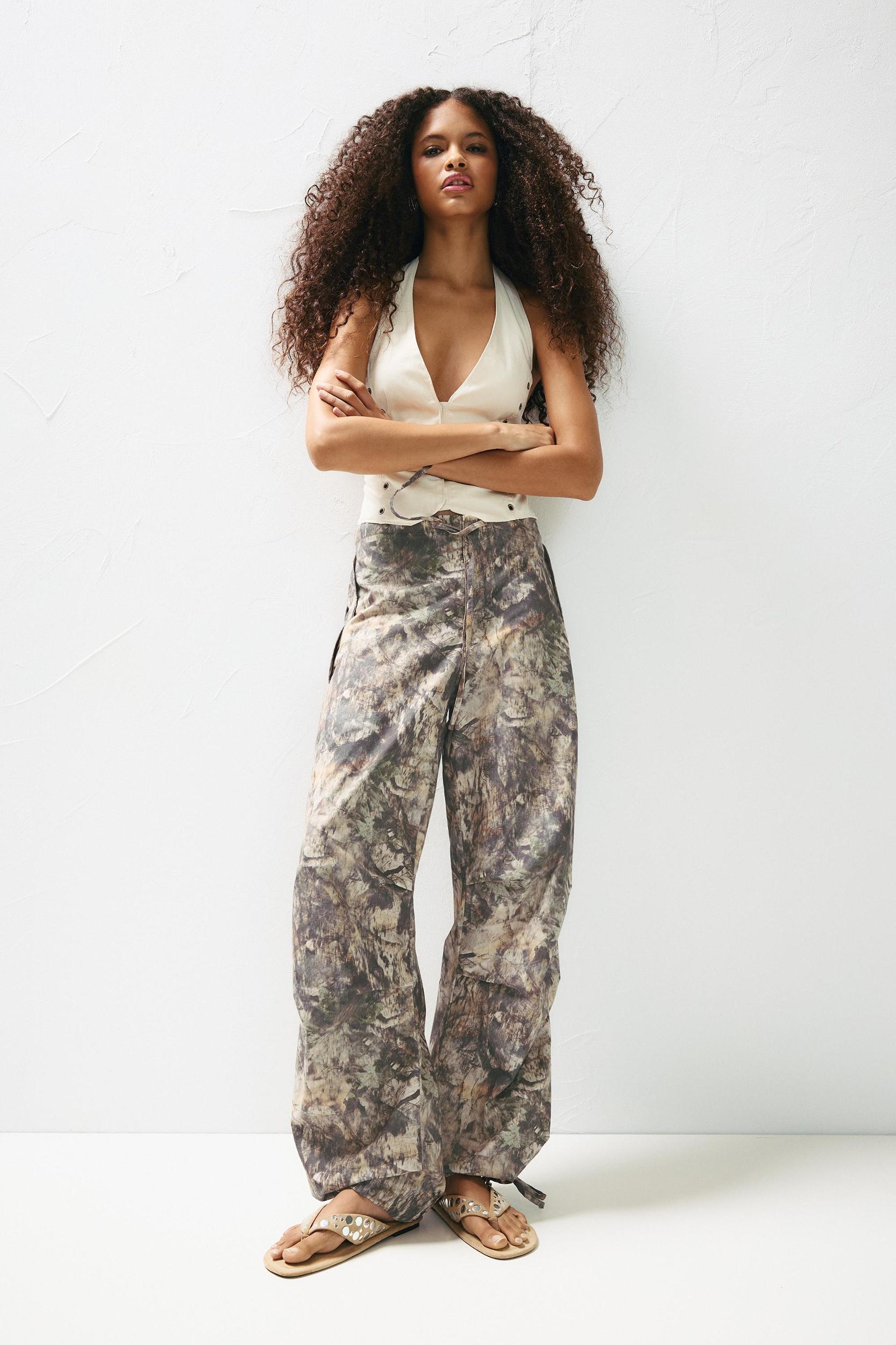 Leaf print parachute trousers Product Image