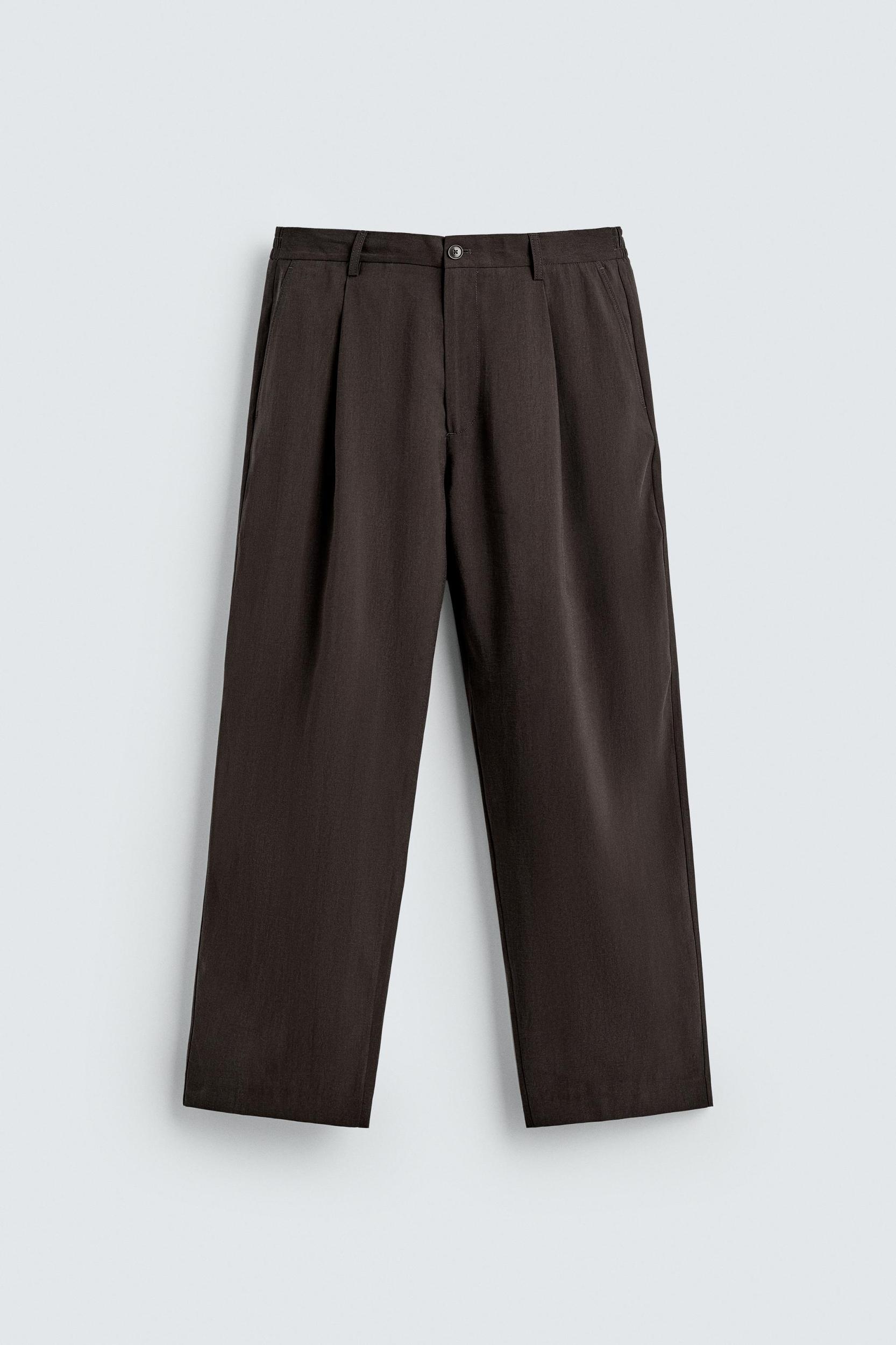PLEATED FLOWY PANTS Product Image