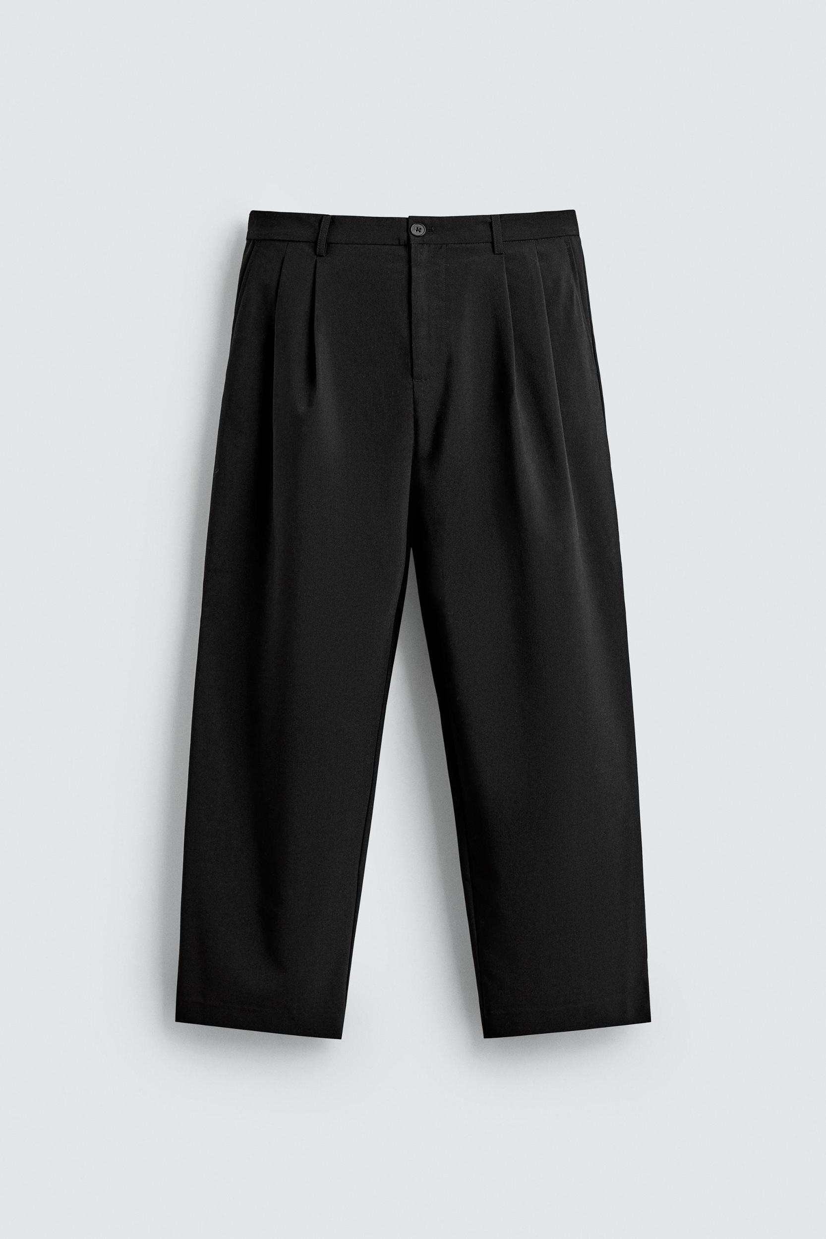 PLEATED WIDE FIT PANTS Product Image