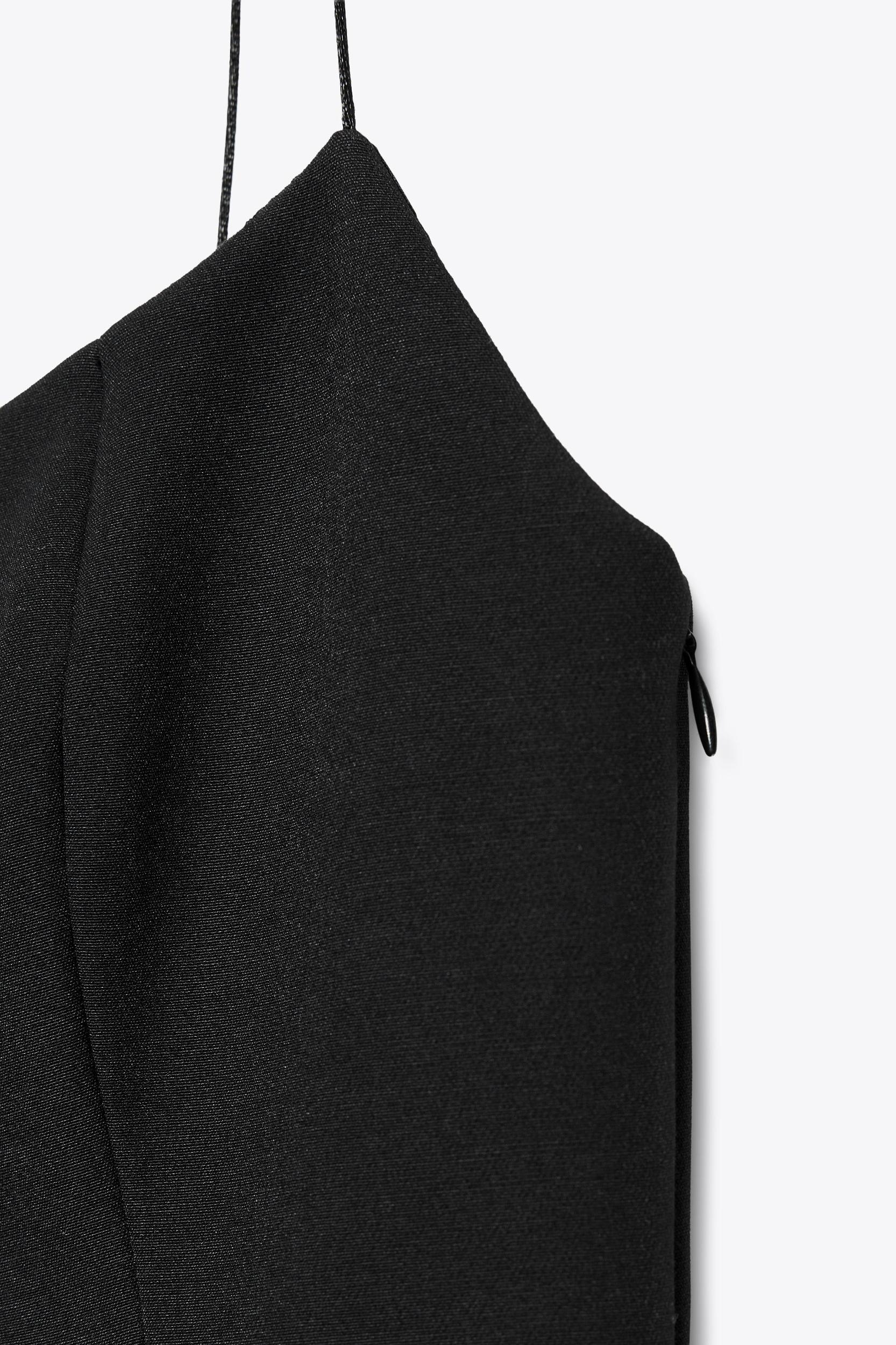 STRETCH PEPLUM TOP Product Image