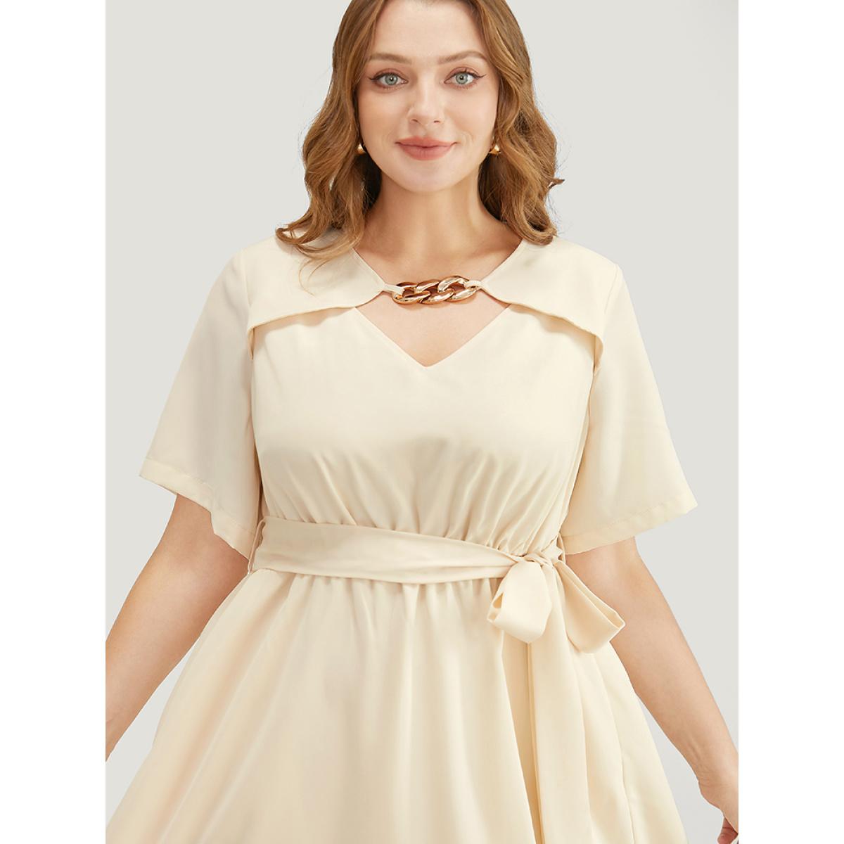 Plus Size Solid Chain Detail Cut Out Pocket Belted Flutter Dress Beige Women Office Cross straps V-neck Short sleeve Curvy Midi Dress BloomChic 30/6X Product Image