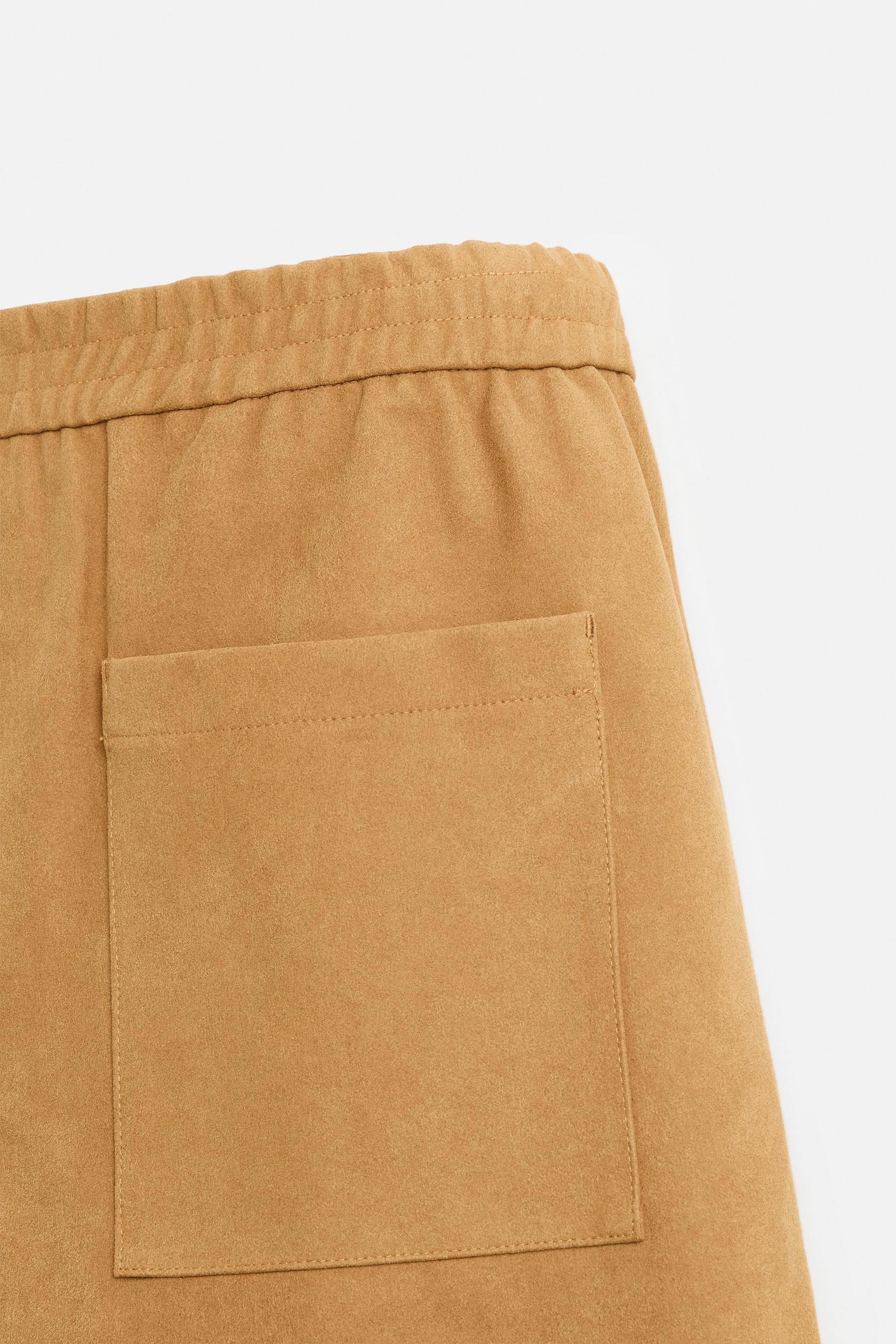 PLEATED FAUX SUEDE SHORTS Product Image