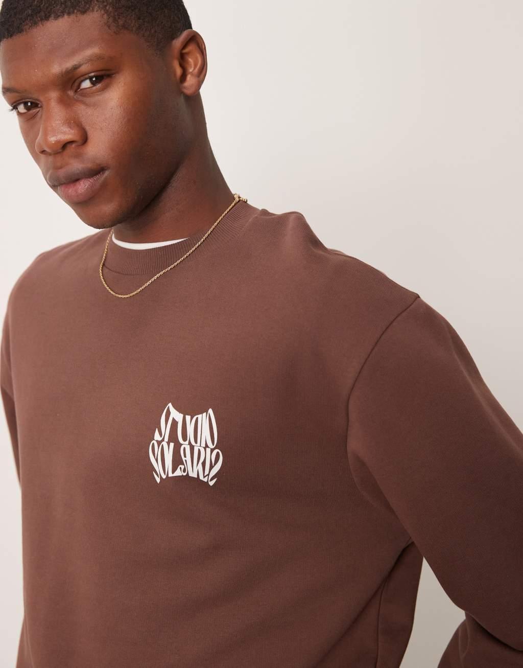 ASOS DESIGN boxy oversized sweatshirt with print in brown Product Image