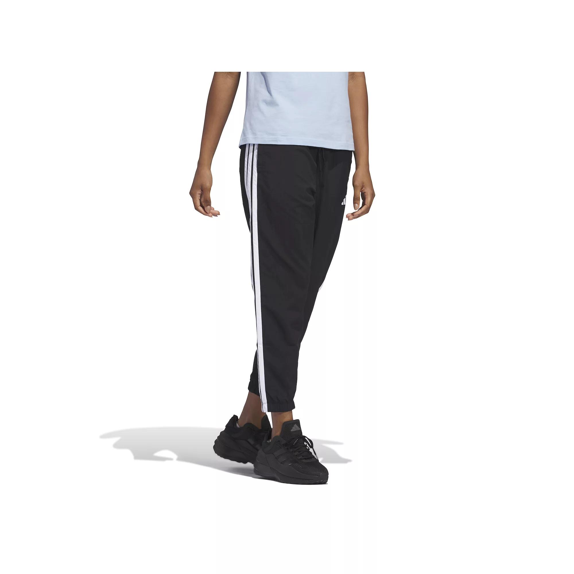 Women's adidas Essentials 3-Stripes Woven 7/8 Sportswear Pants, Size: XL, Black Product Image