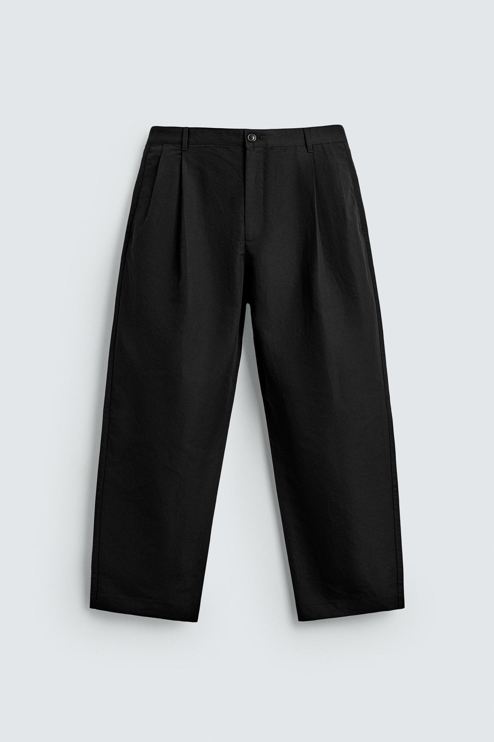 RELAXED FIT PLEATED PANTS Product Image