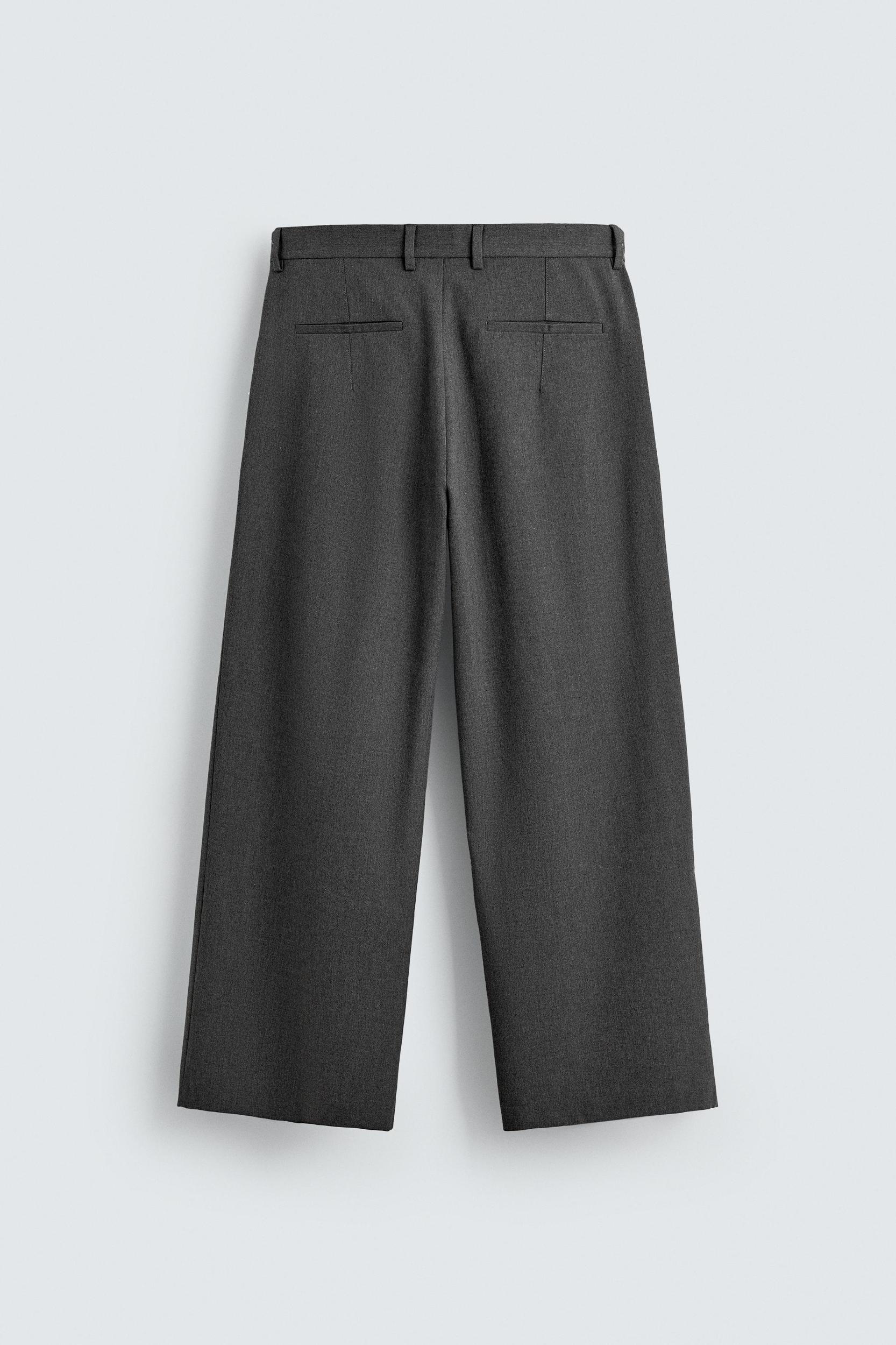 PLEATED WIDE FIT PANTS Product Image