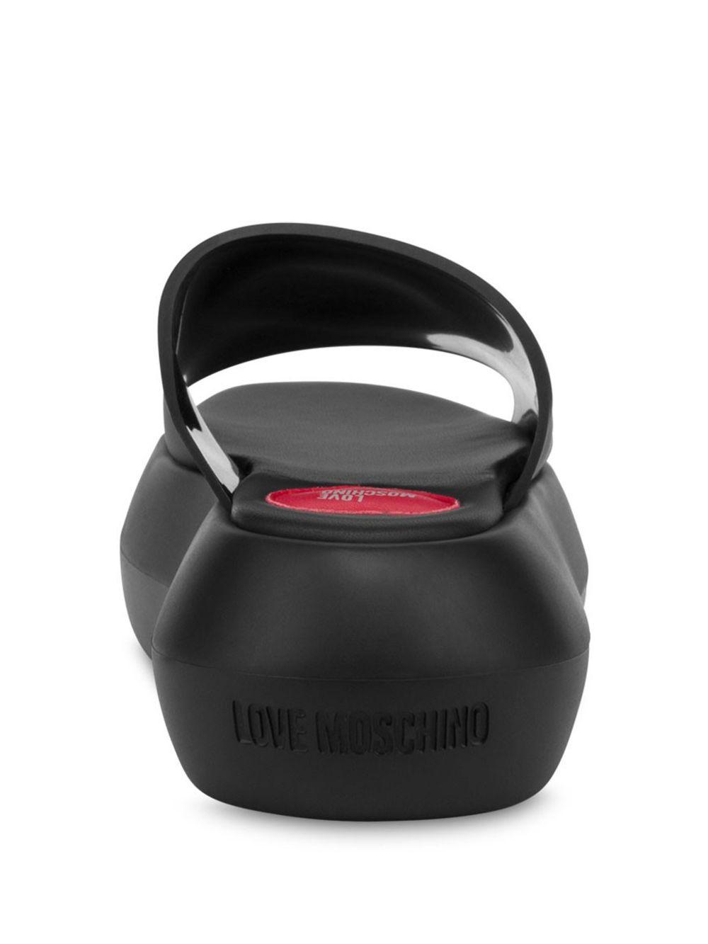 logo-embossed slides Product Image