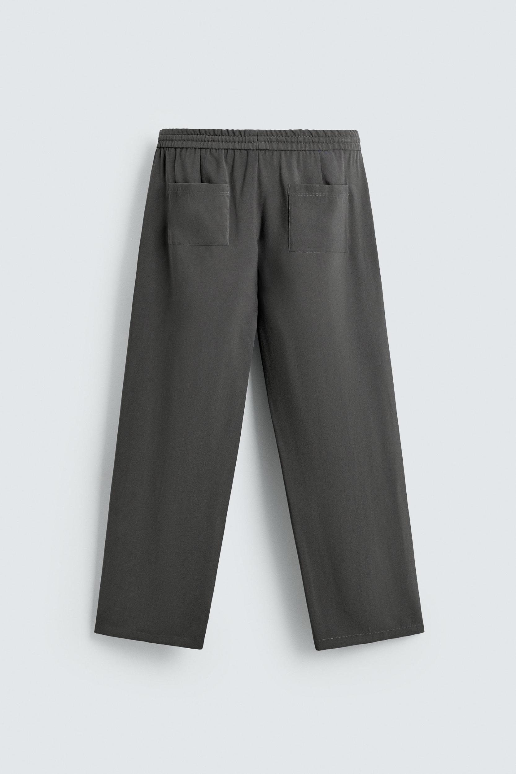 FLOWY TOPSTITCHED PANTS Product Image