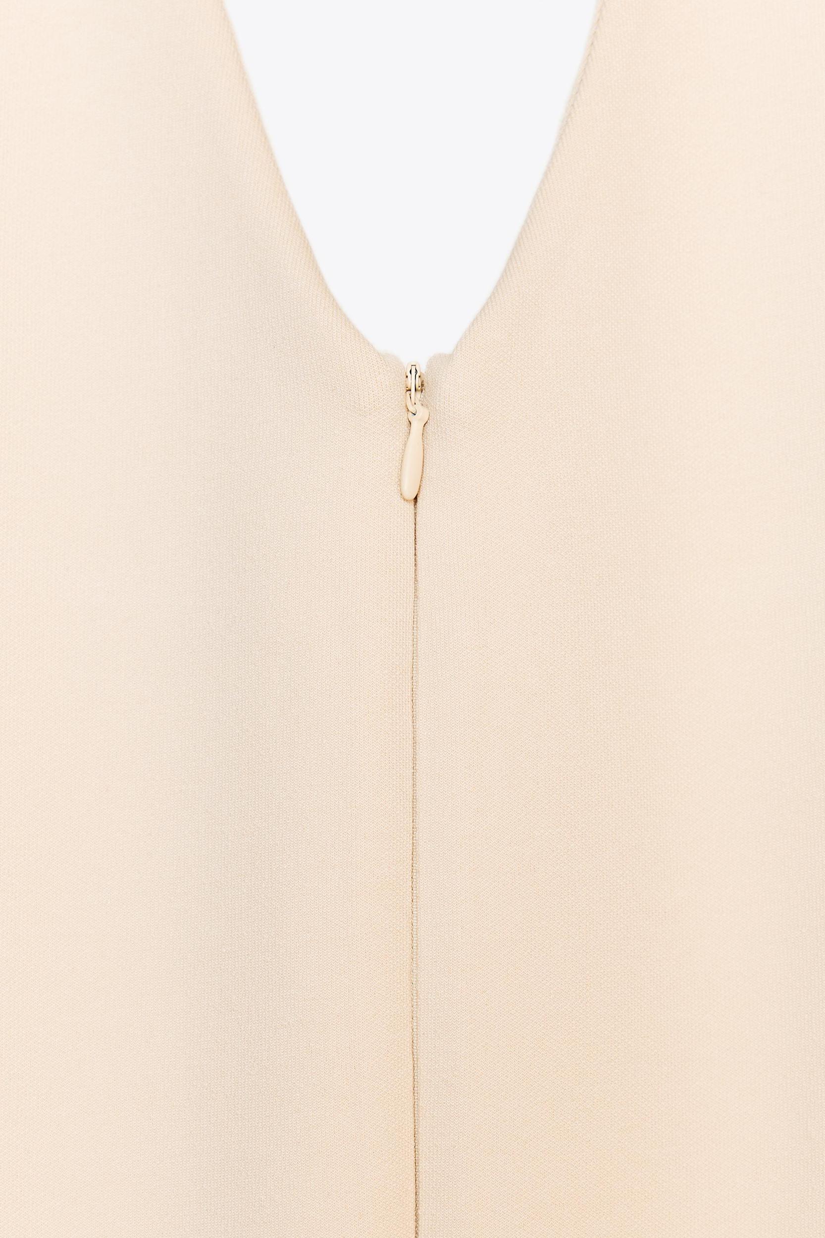 LONG HALTER INTERLOCK JUMPSUIT Product Image