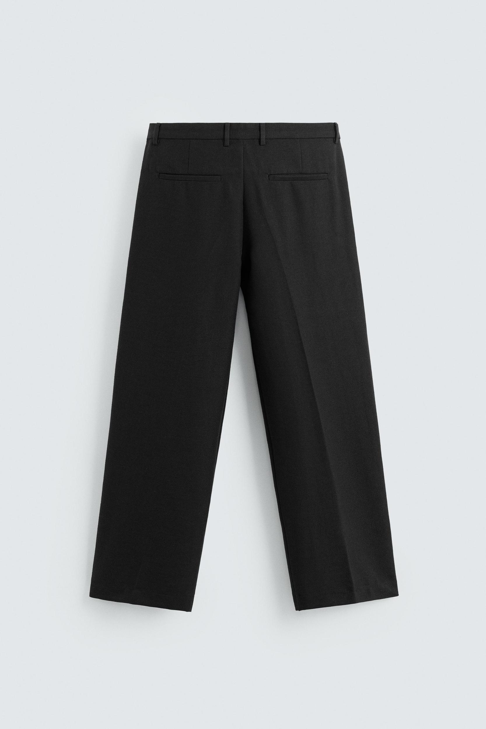 PLEATED RELAXED FIT PANTS Product Image