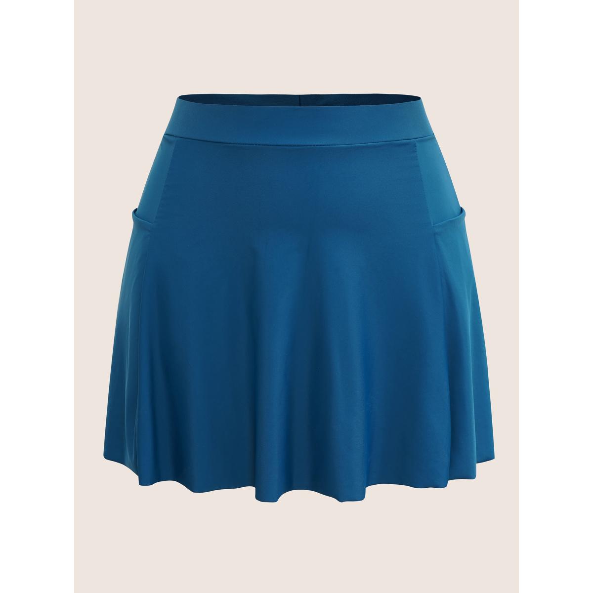 Plus Size Solid Patched Pocket Side Pleated Swim Skirt Women's Swimwear Indigo Beach Non High stretch Bodycon High Rise Slanted pocket Curve Swim Bottoms BloomChic 30/6X Product Image