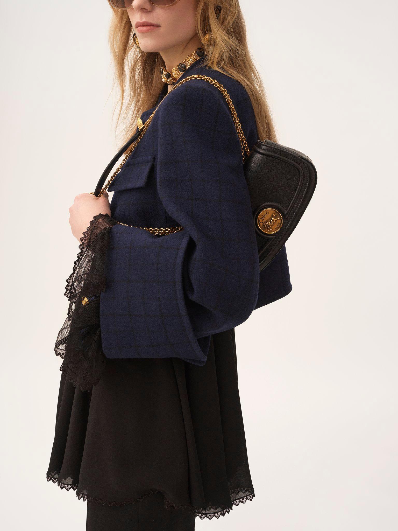 Horse Medal crossbody bag in grained leather Product Image