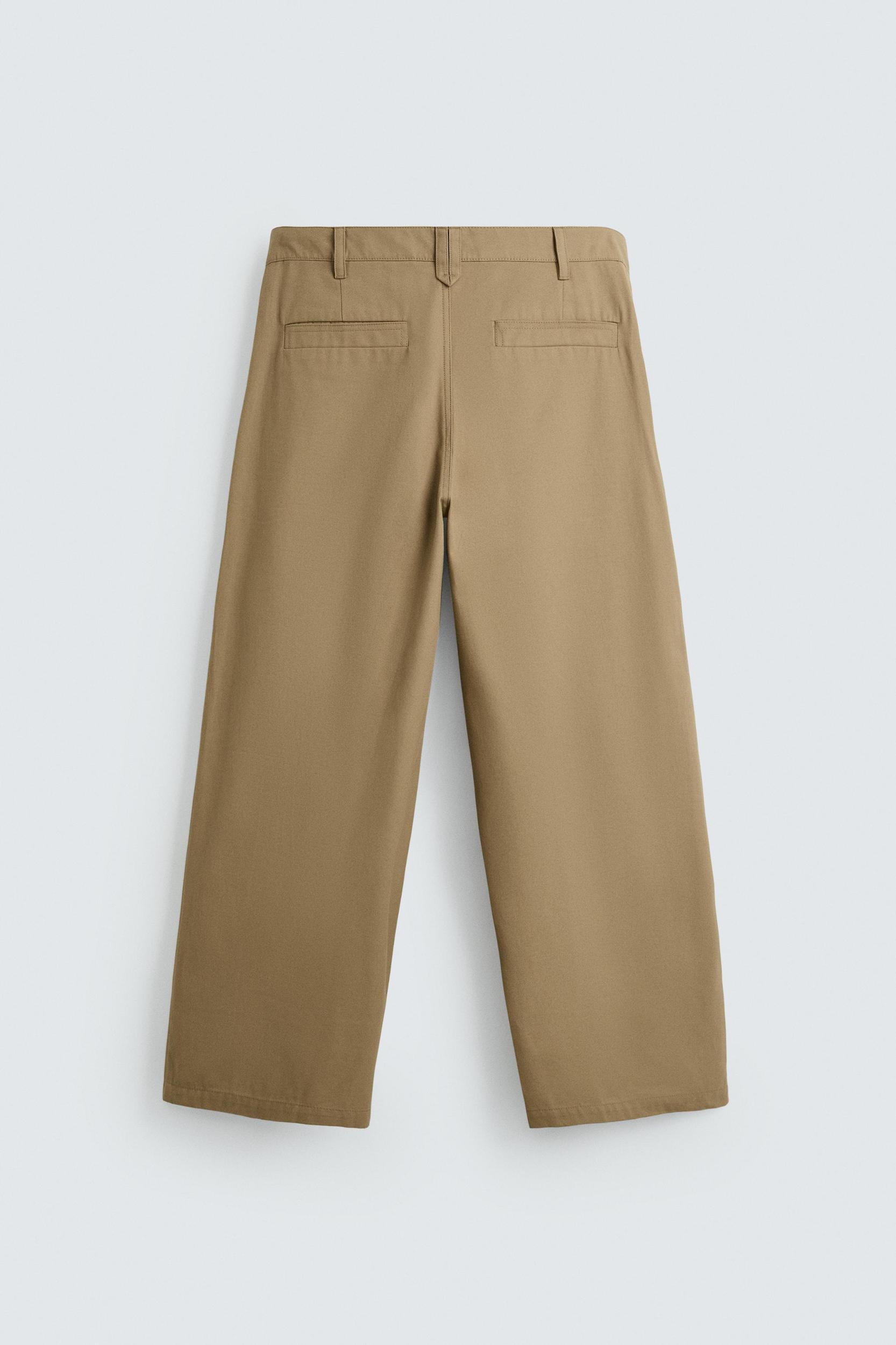 PLEATED WIDE FIT PANTS Product Image