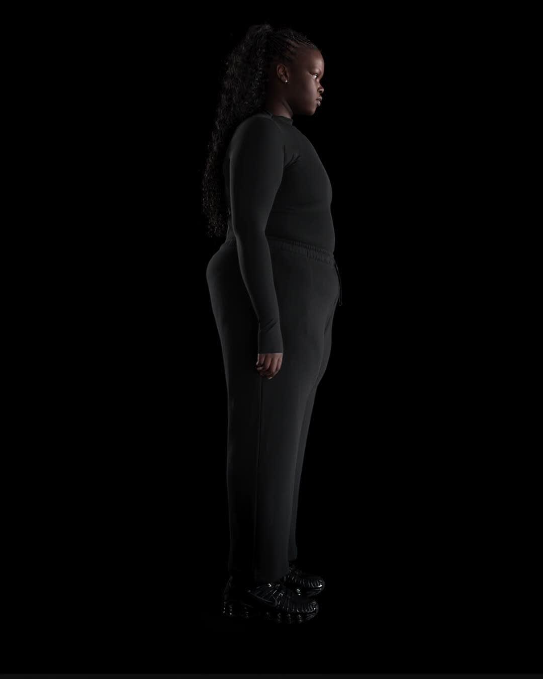 Women's Nike Sportswear Club Fleece Mid-Rise Wide-Leg Graphic Pants (Plus Size) Product Image