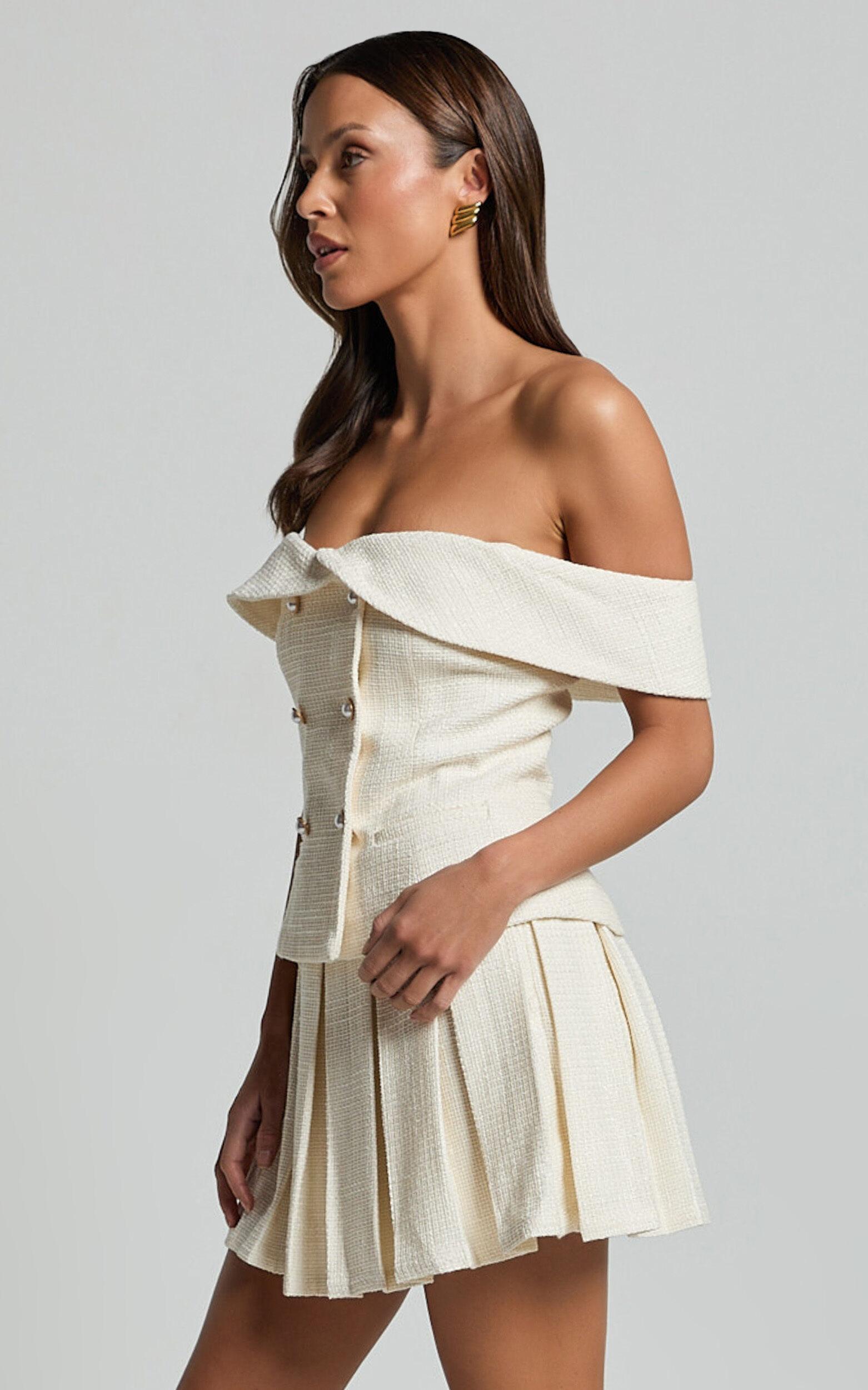 Maggie Mini Skirt - Pleated Mid Rise Boucle Skirt in Cream Product Image