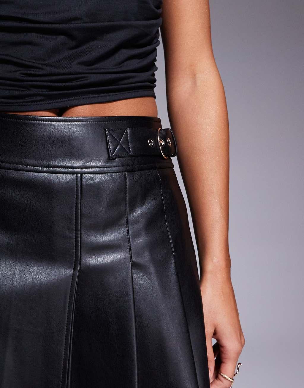 River Island faux leather pleated mini skirt in black Product Image