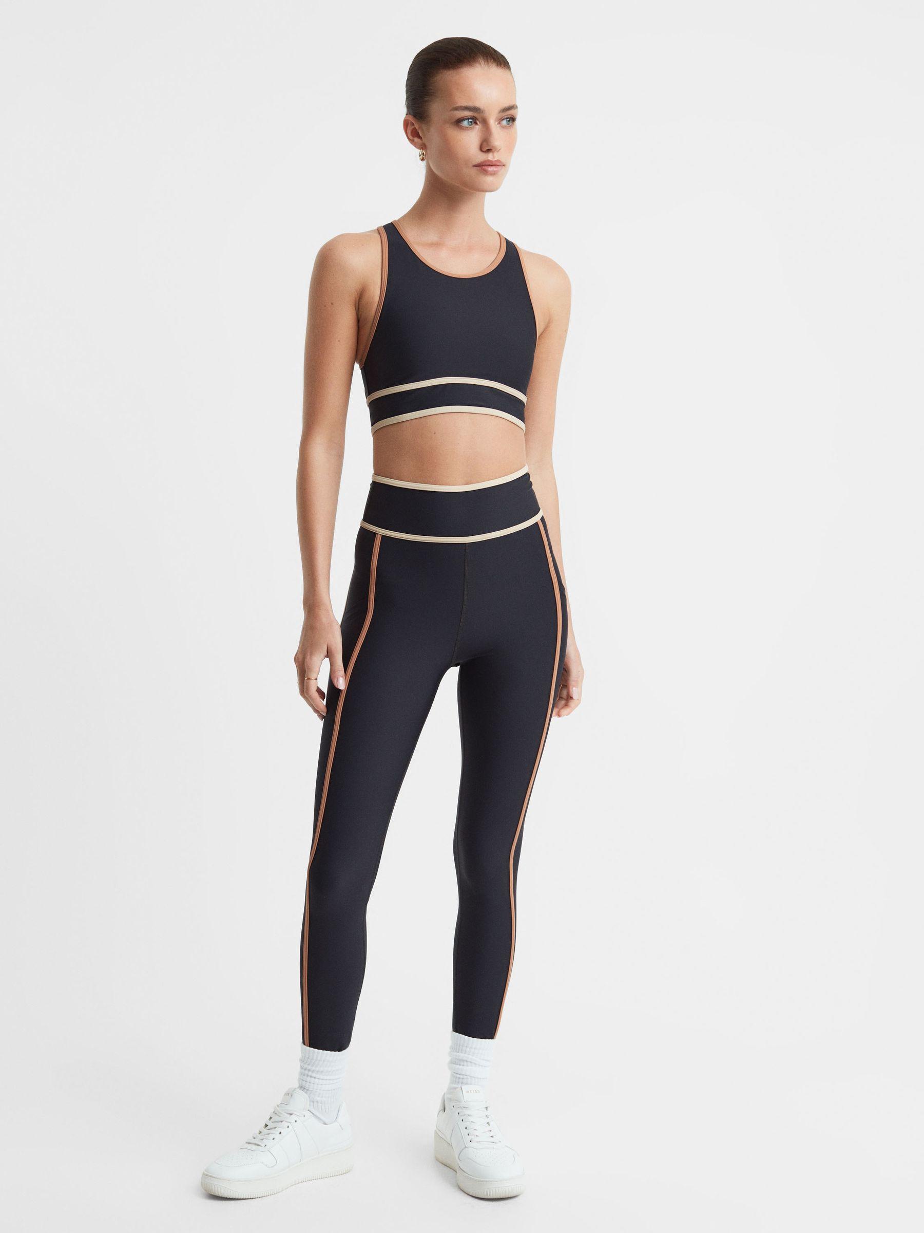 The Upside Racerback Cut-Out Sports Bra in Black Product Image