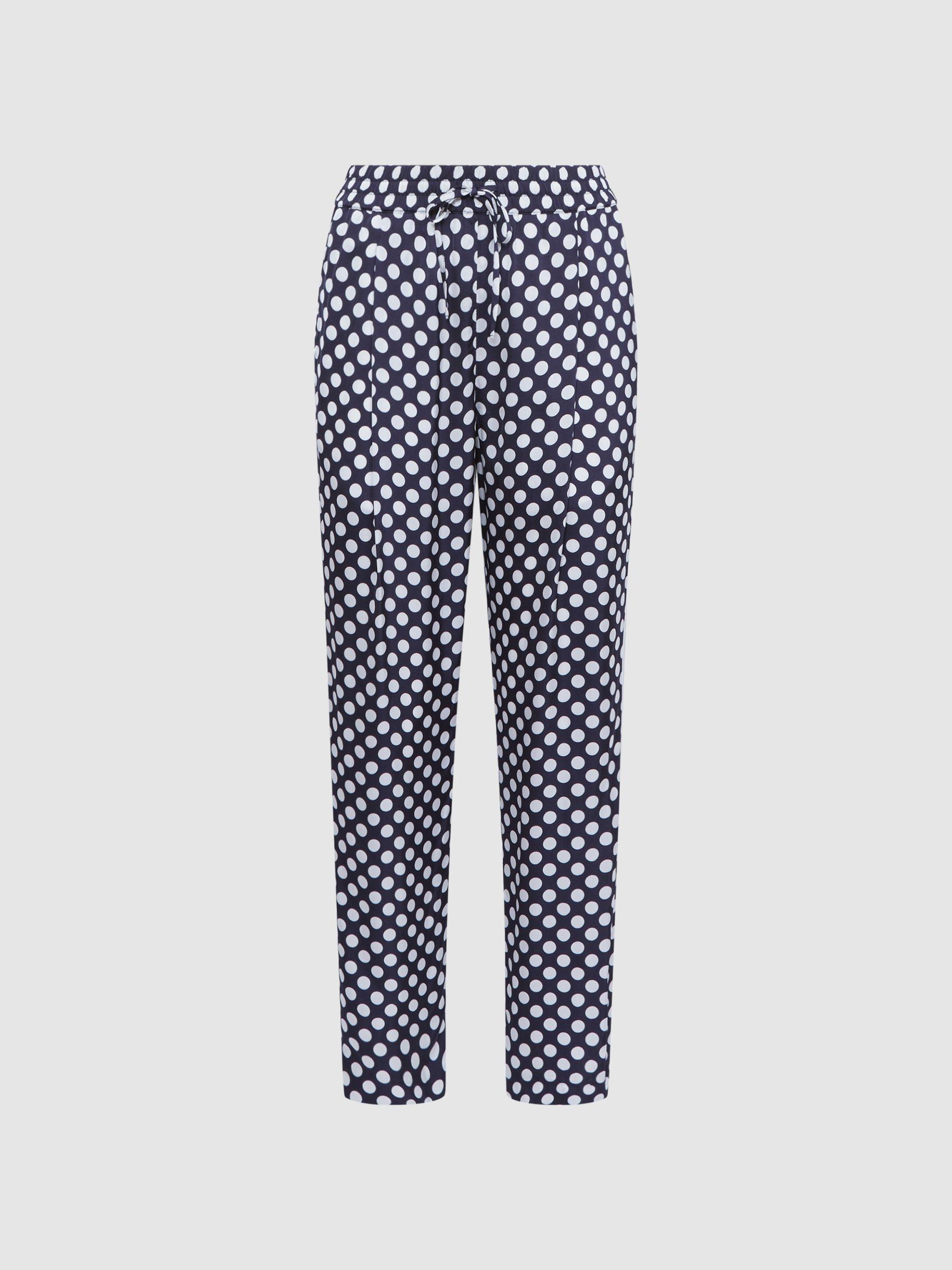 Polka Dot Drawstring Tapered Trousers in Navy/White Product Image