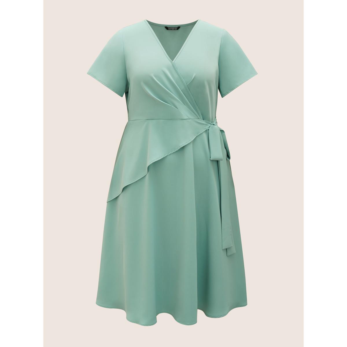 Plus Size Static-Free Overlap Collar Pleated Tie Knot Dress Mint Women At the Office Overlapping Overlap Collar Short sleeve Curvy Midi Dress BloomChic 26/4X Product Image