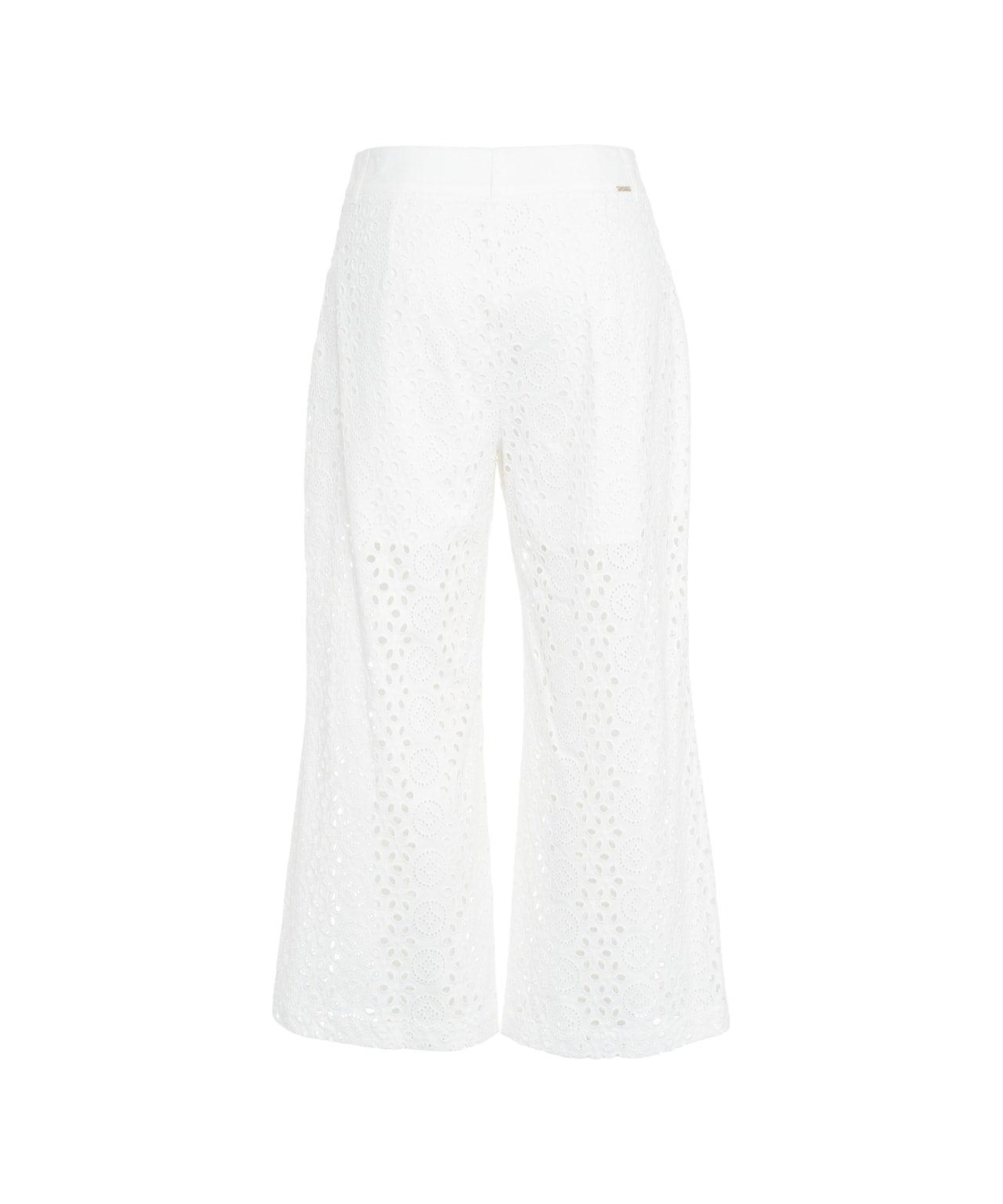 Pants with perforated embroidery Product Image