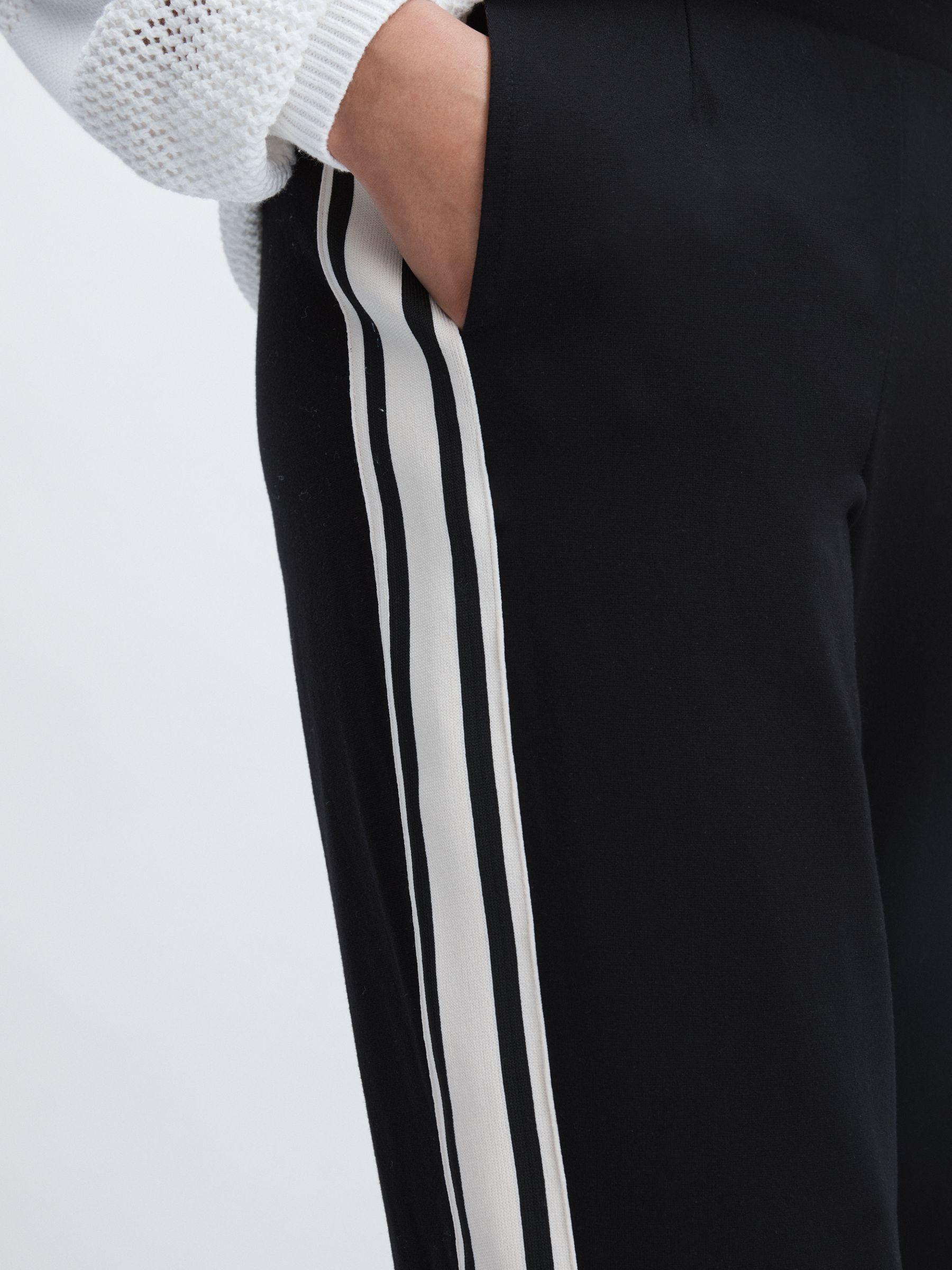 Flared Track Trousers in Black Product Image