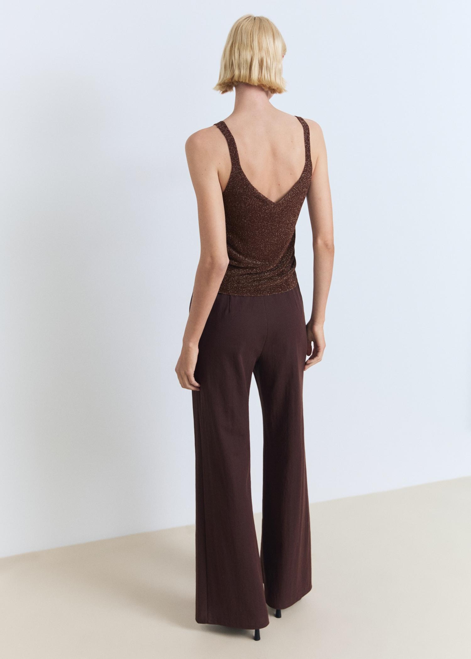 Lurex knitted V-neck top - Women | MANGO USA Product Image