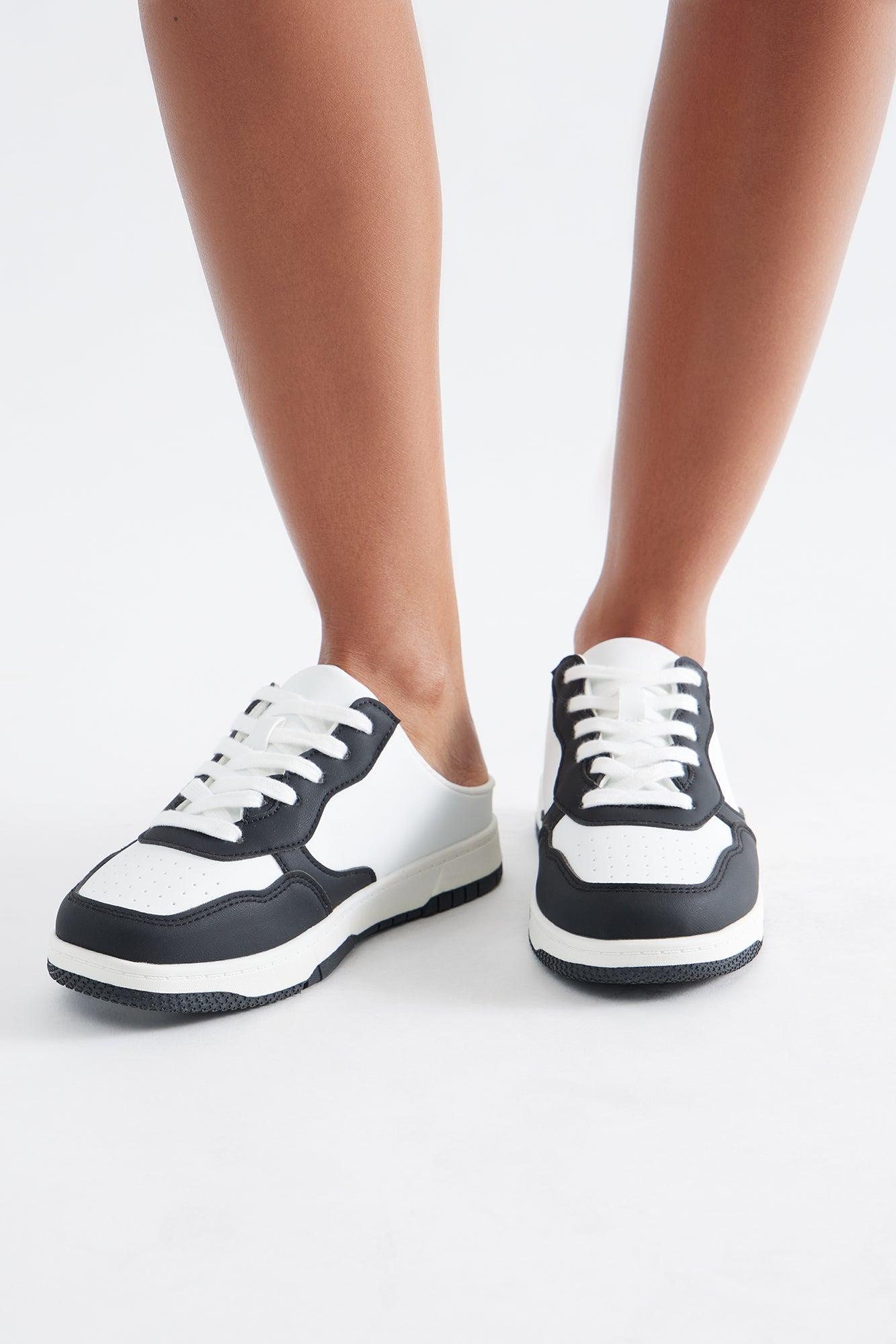 Griffin Faux Leather Slip On Sneakers - Black Female Product Image