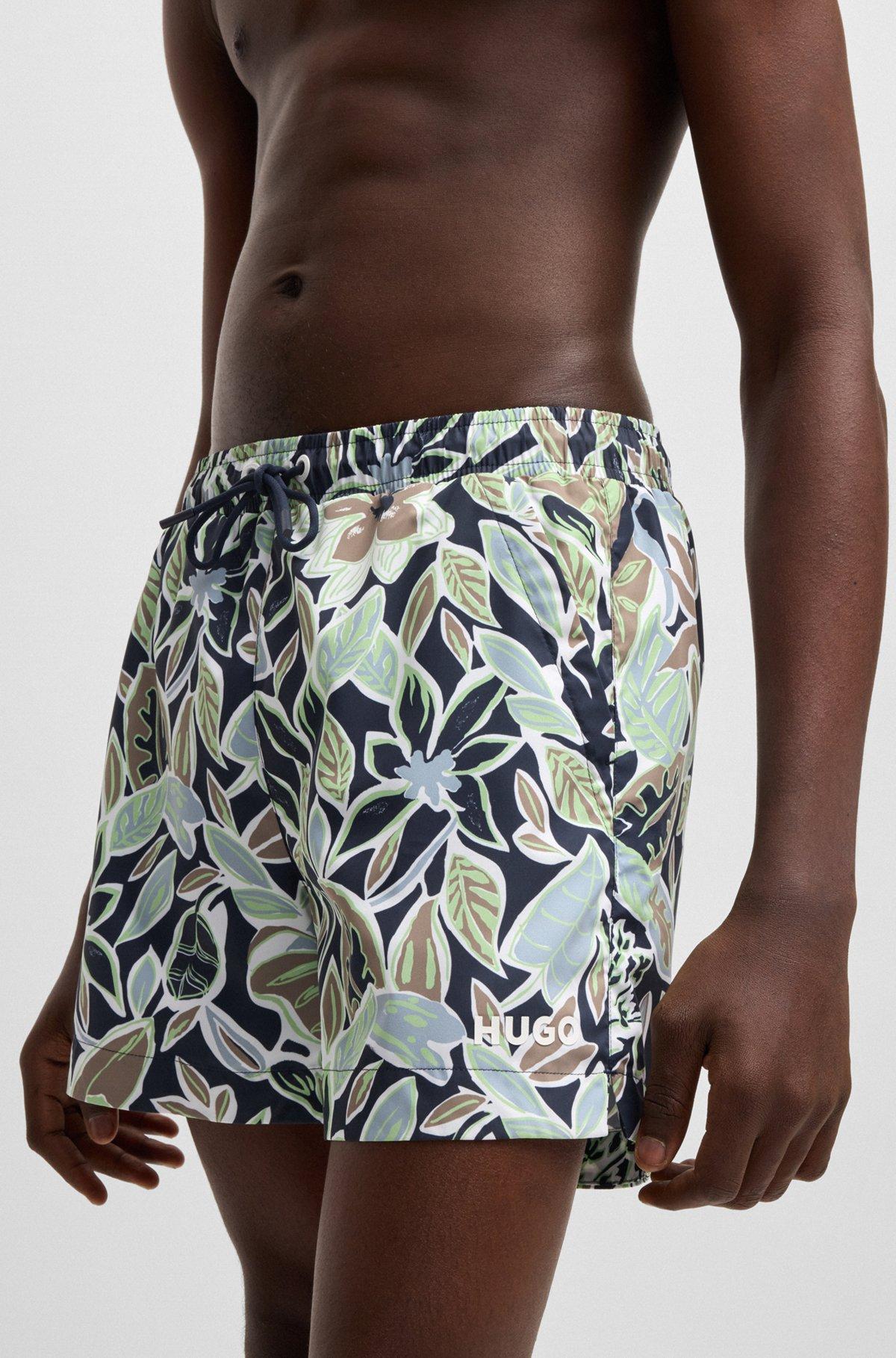 HUGO - Fully lined swim shorts with seasonal print - Dark Blue Product Image