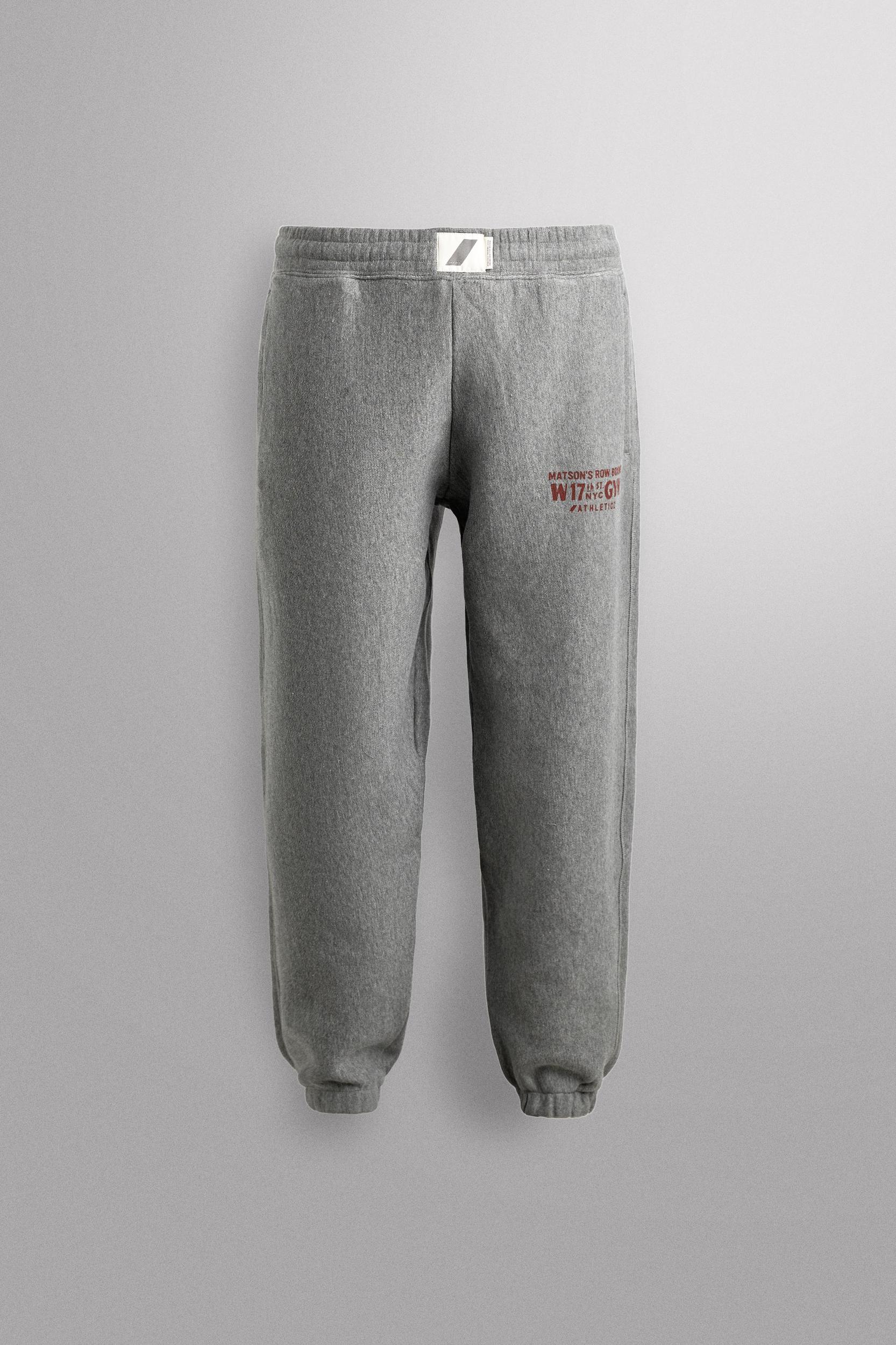 JOGGING PANTS WITH PRINTED TEXT Product Image