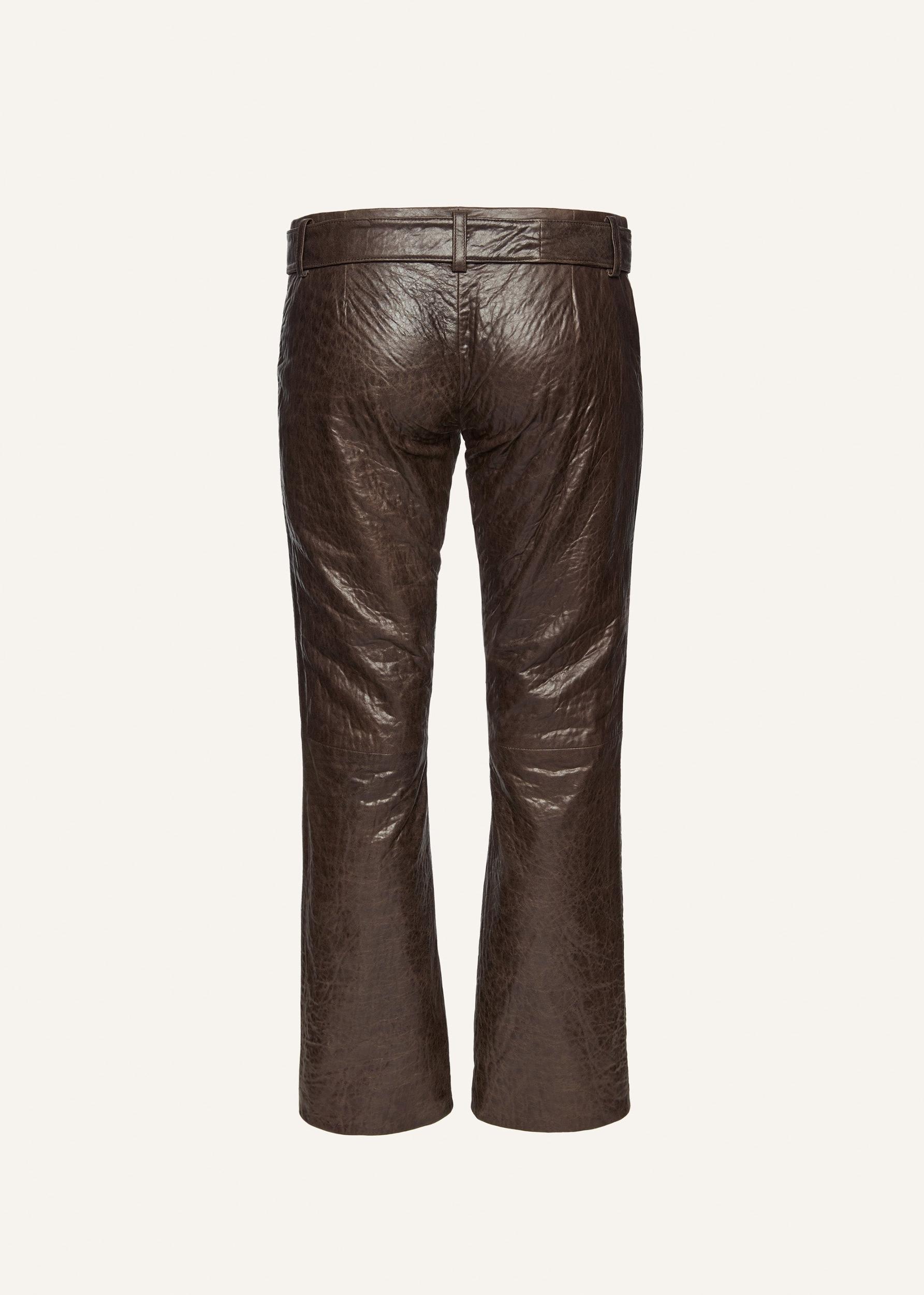 Crinkled leather belted pants in brown Product Image