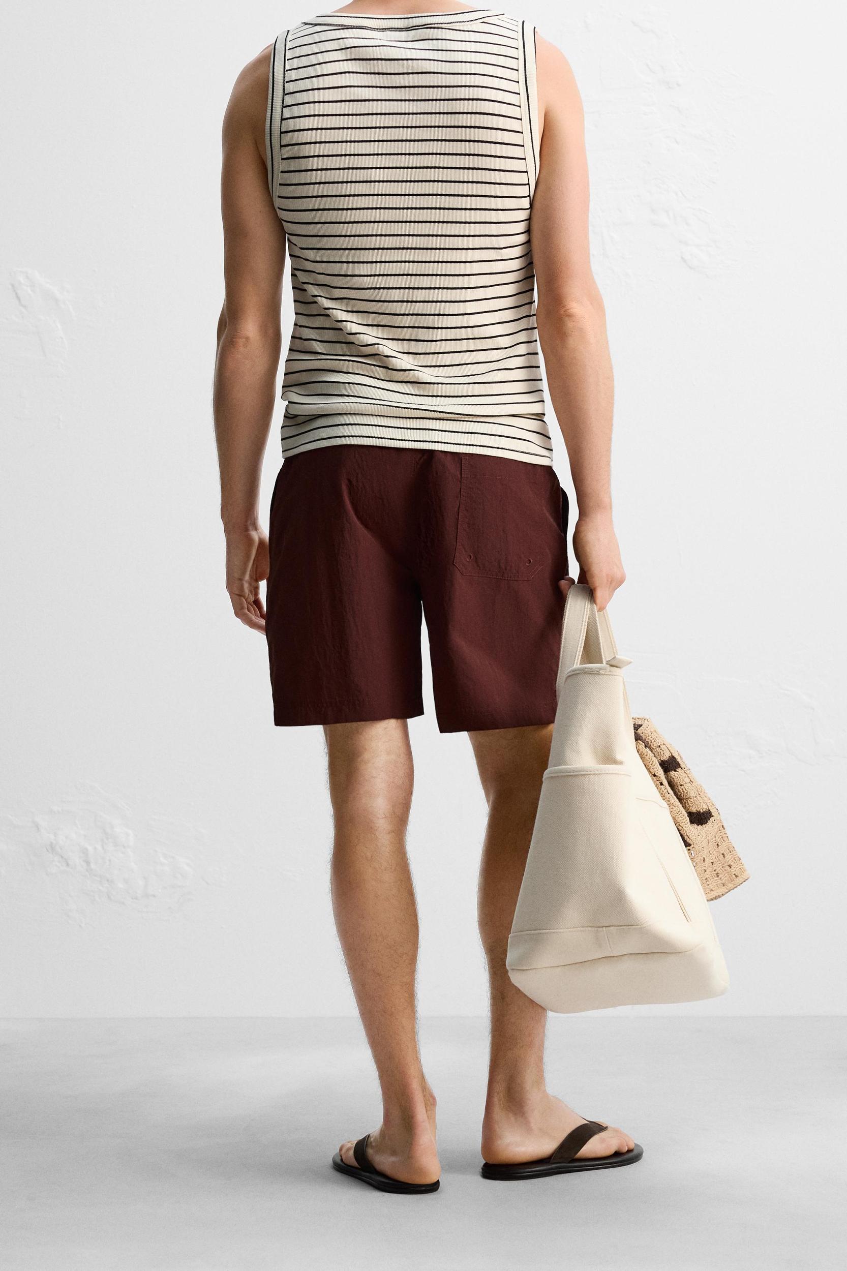 DRAWSTRING SWIM TRUNKS Product Image