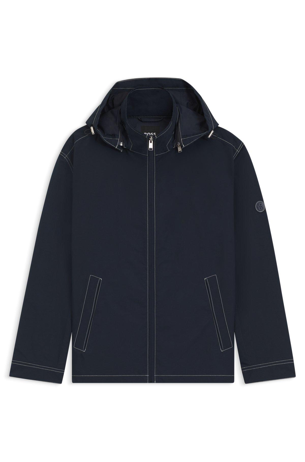 Packable hooded jacket in water-repellent mixed fabrics Product Image