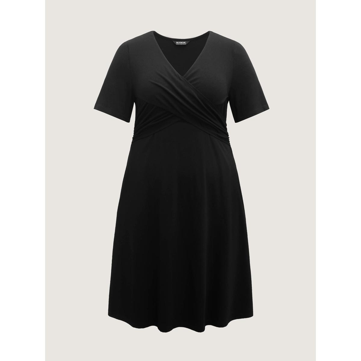 Plus Size Overlap Bodice Solid Knit Pockets Midi Dress Black Women Leisure Overlap Collar Short sleeve Curvy BloomChic 12/L Product Image