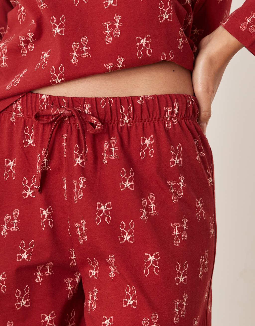 ASOS DESIGN top and pants pajama set in red bow print Product Image