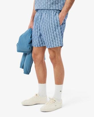 Mid Length Monogram Print Swim Trunks Product Image